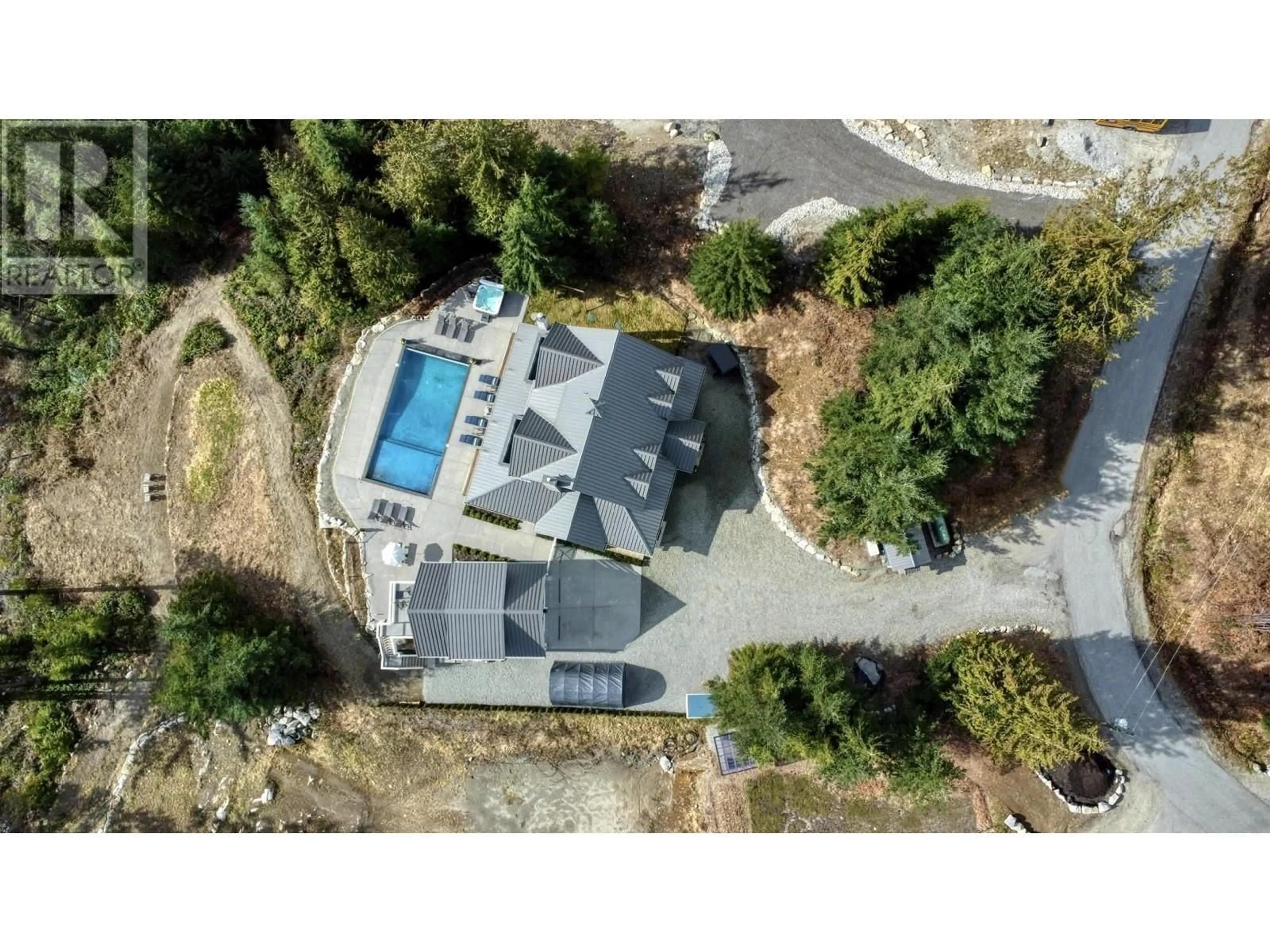 A pic from outside/outdoor area/front of a property/back of a property/a pic from drone, mountain view for 165 WITHERBY ROAD, Gibsons British Columbia V0N1V6