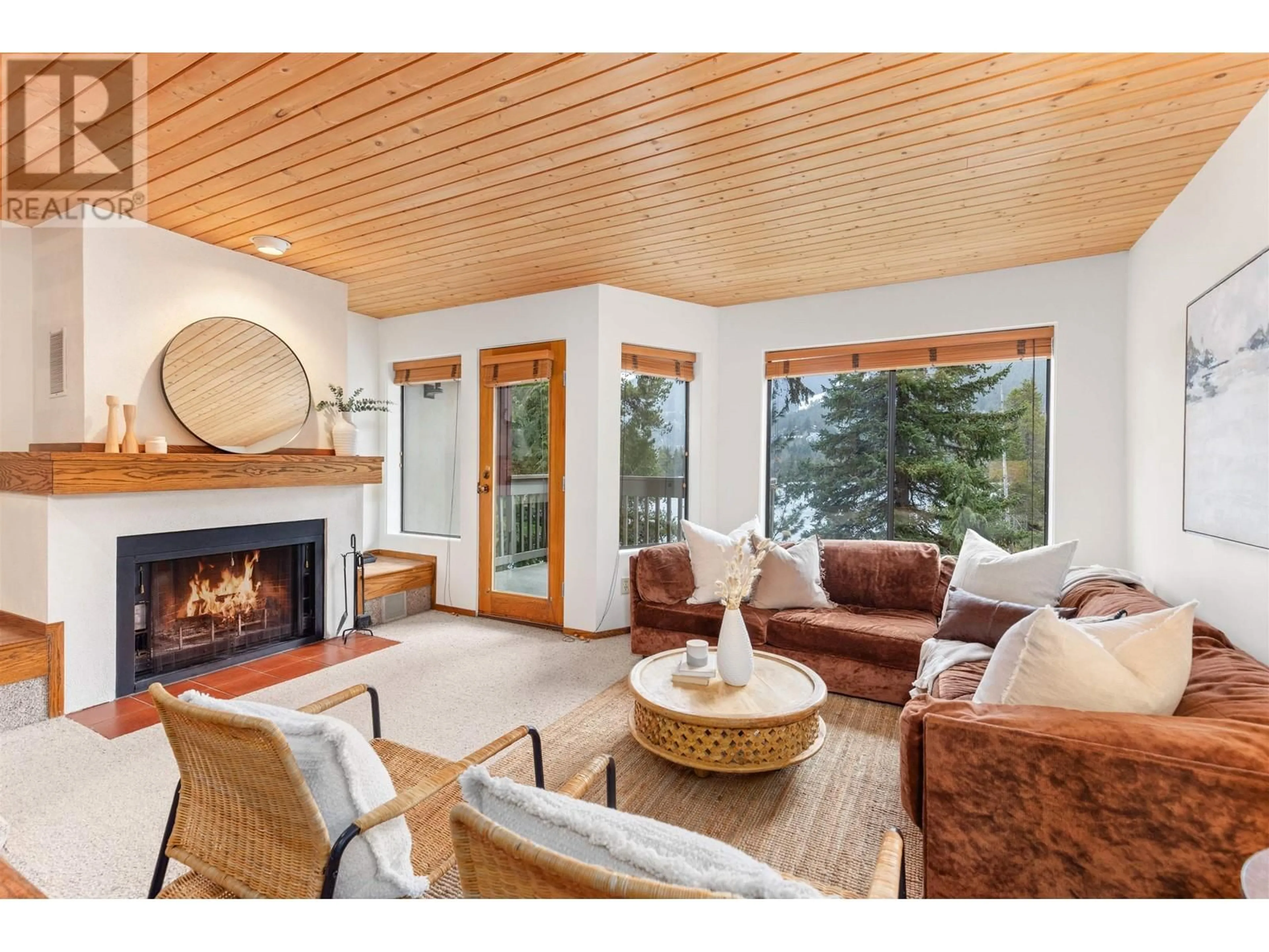 Living room with furniture, wood/laminate floor for 11 1200 ALTA LAKE ROAD, Whistler British Columbia V8E0H4