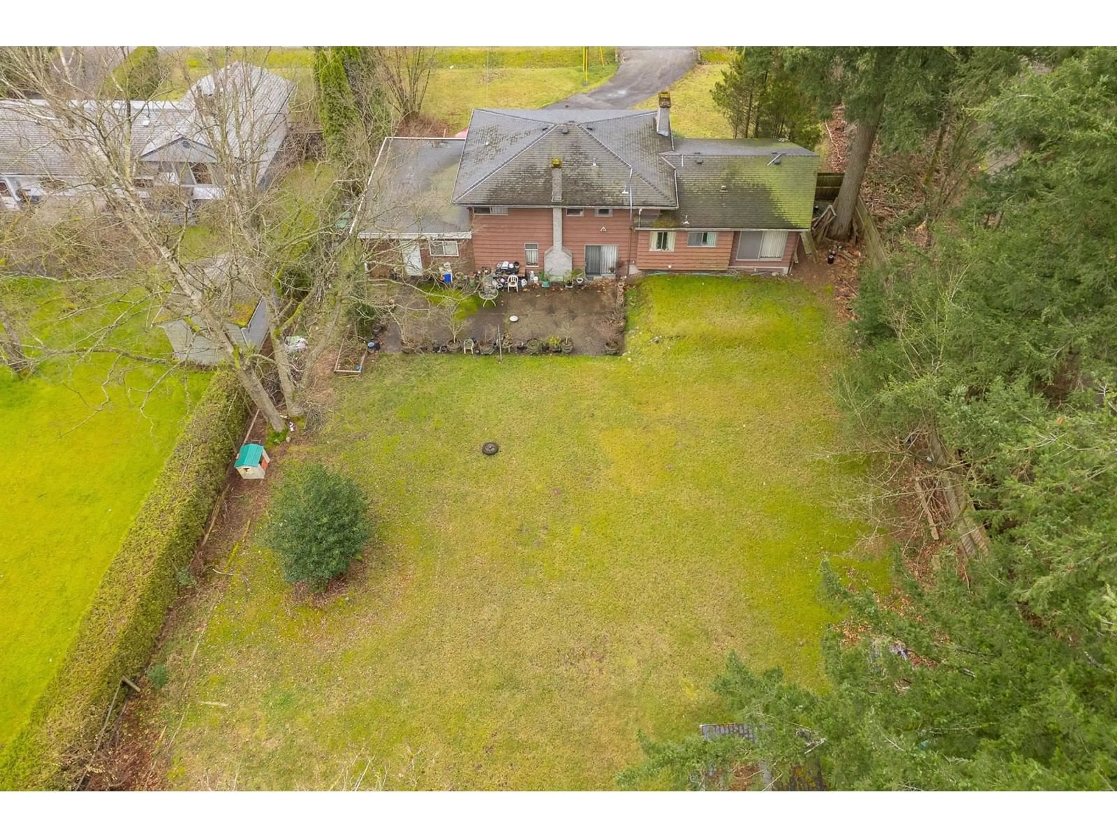 A pic from outside/outdoor area/front of a property/back of a property/a pic from drone, street for 14457 110 AVENUE, Surrey British Columbia V3R2A4