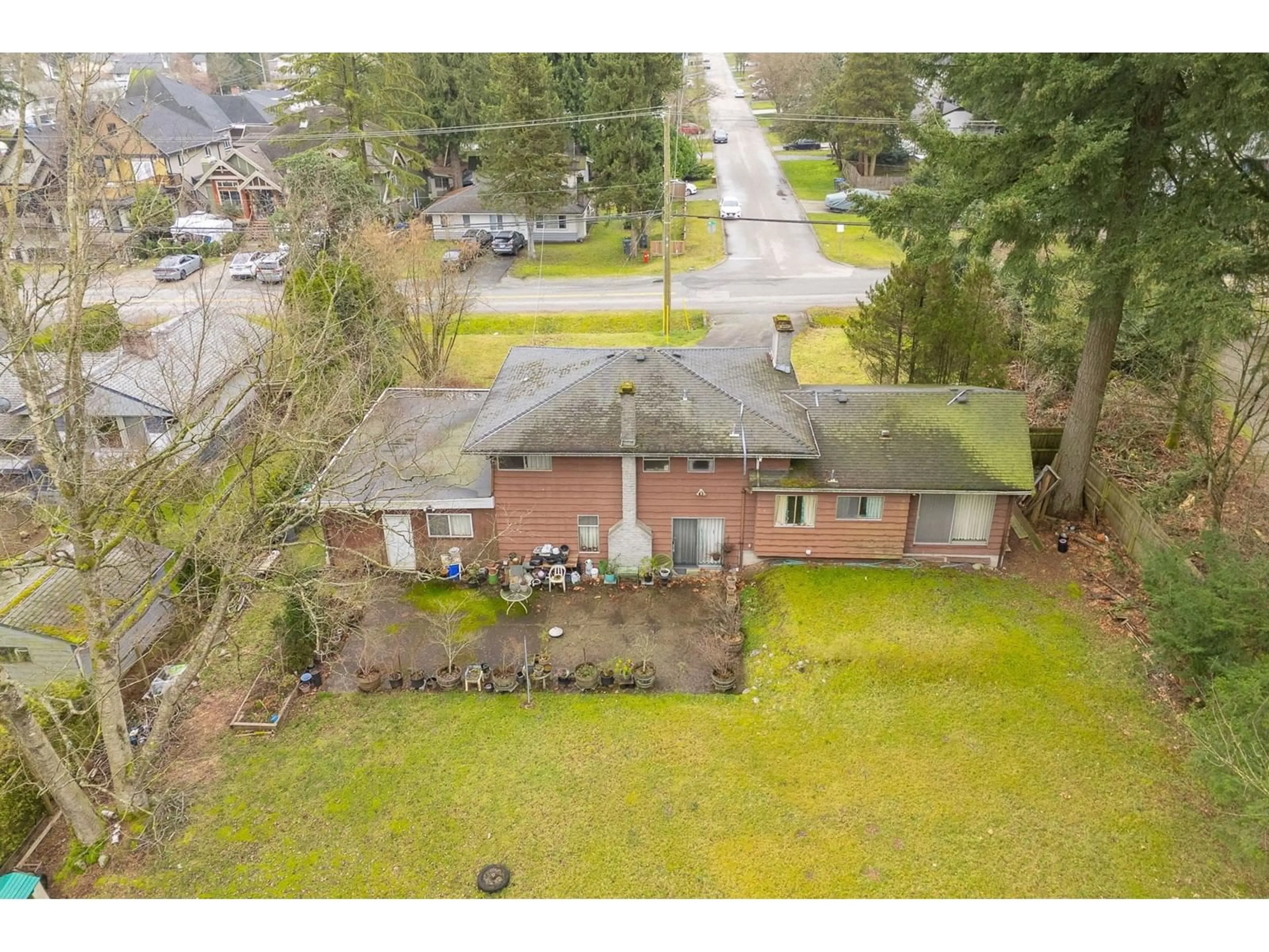 A pic from outside/outdoor area/front of a property/back of a property/a pic from drone, street for 14457 110 AVENUE, Surrey British Columbia V3R2A4