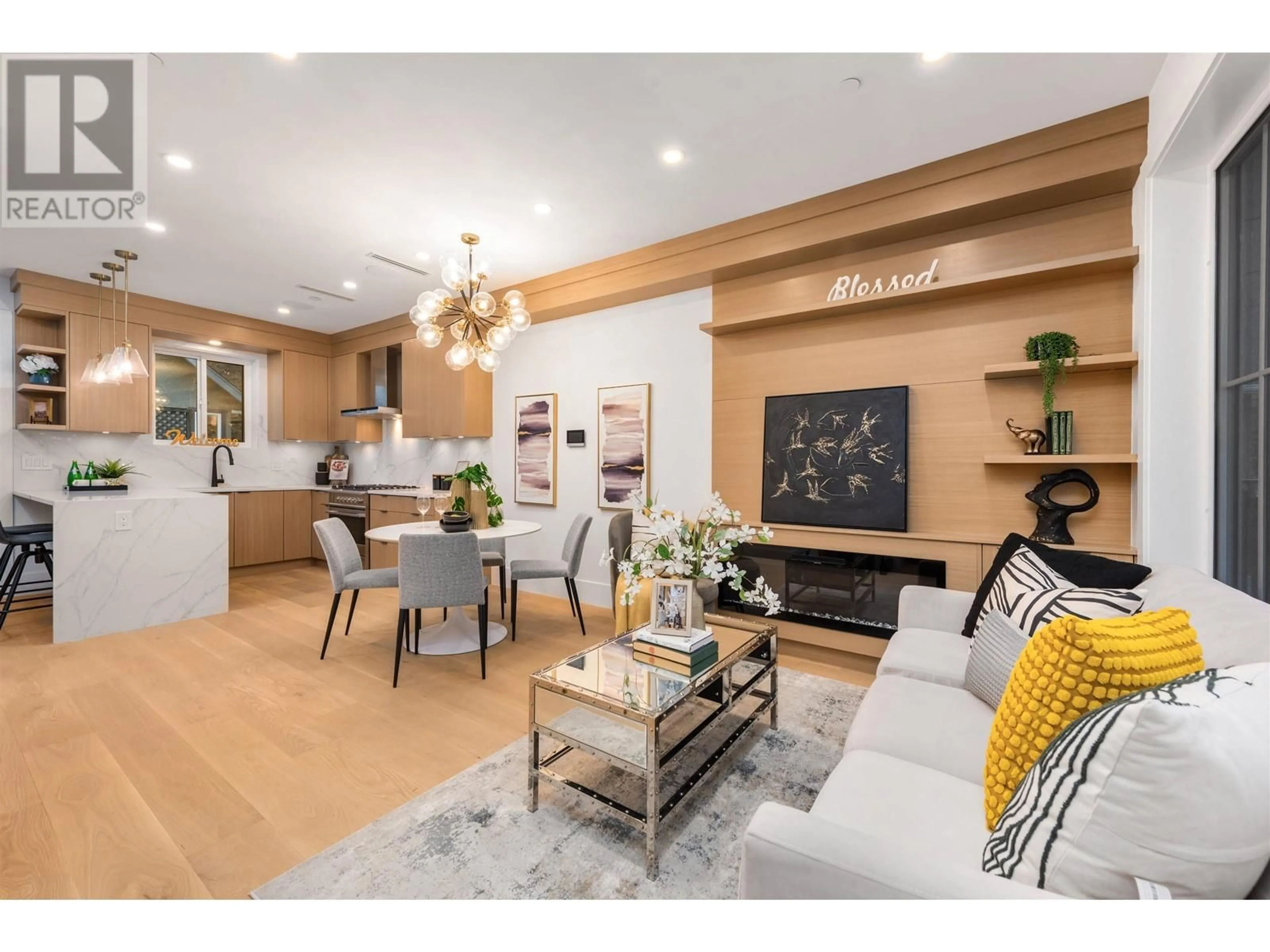 Living room with furniture, wood/laminate floor for 2052 FERNDALE STREET, Vancouver British Columbia V5L1Y1