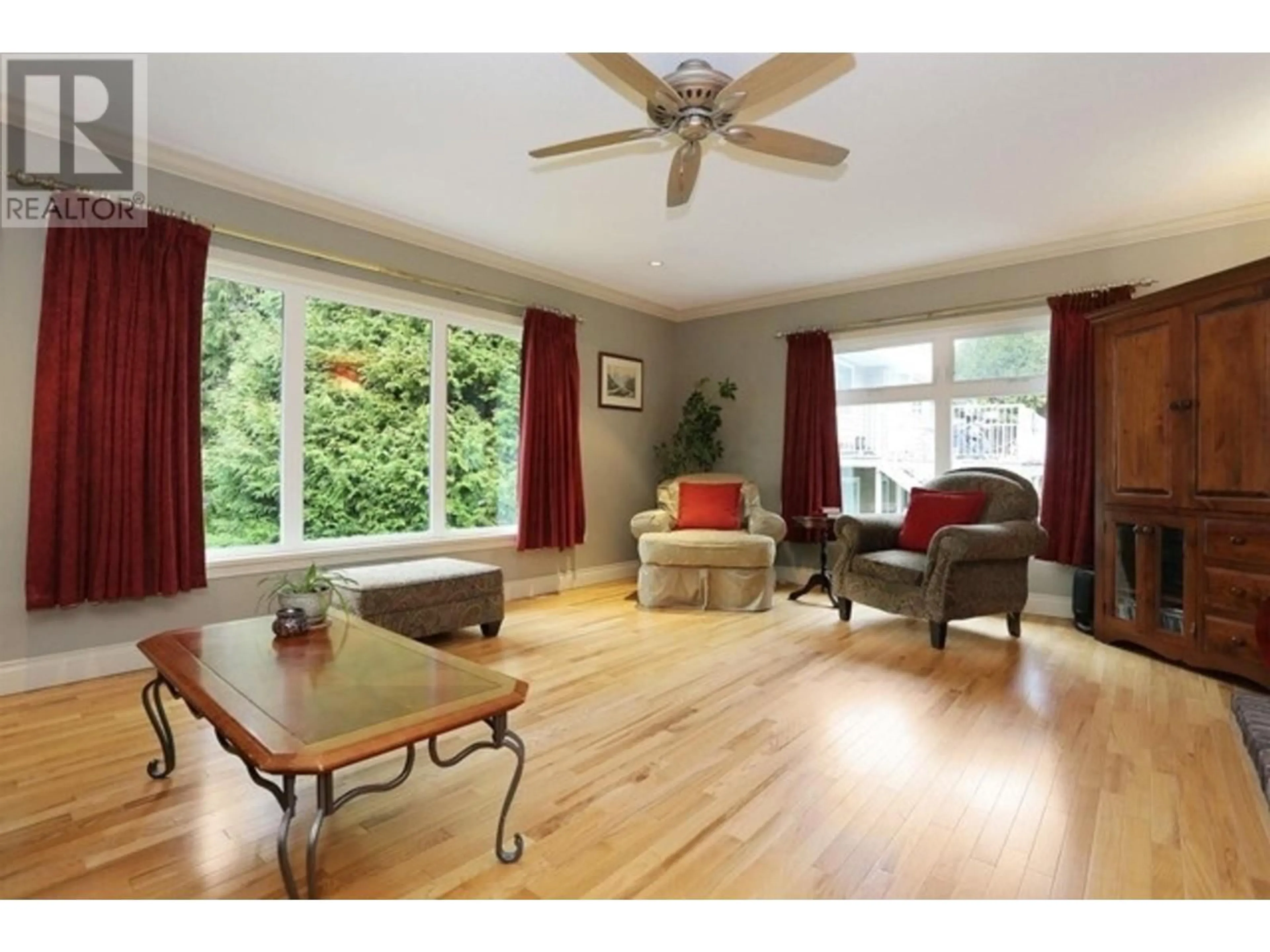 Living room with furniture, wood/laminate floor for 5214 12 AVENUE, Delta British Columbia V4M2A8