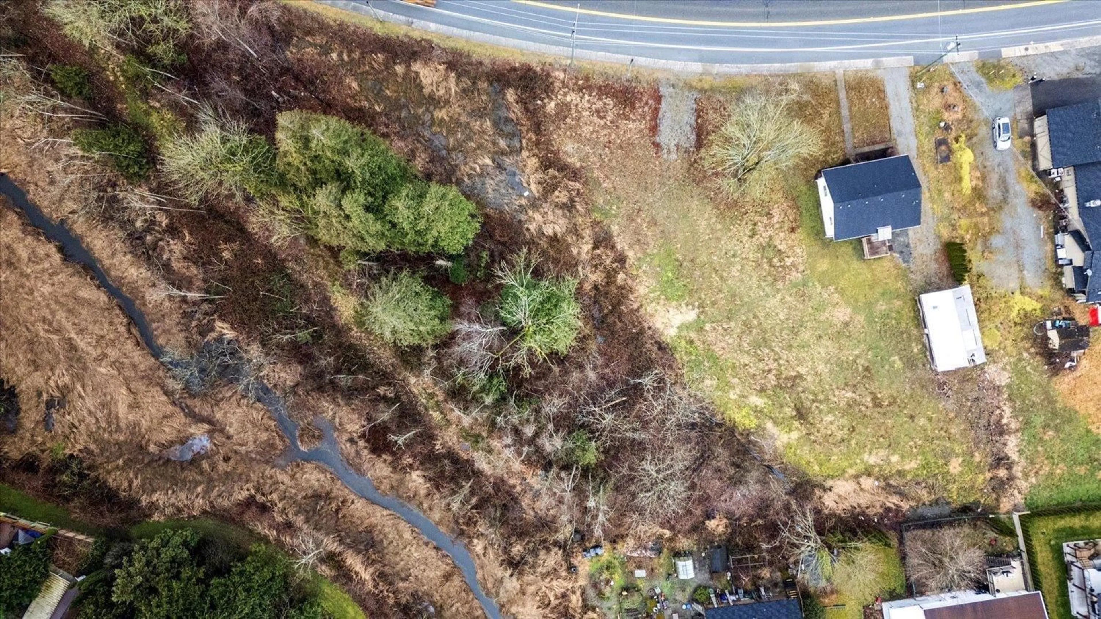 A pic from outside/outdoor area/front of a property/back of a property/a pic from drone, forest/trees view for 905 HOT SPRINGS ROAD|Harrison Hot Spring, Harrison Hot Springs British Columbia V0M1A3