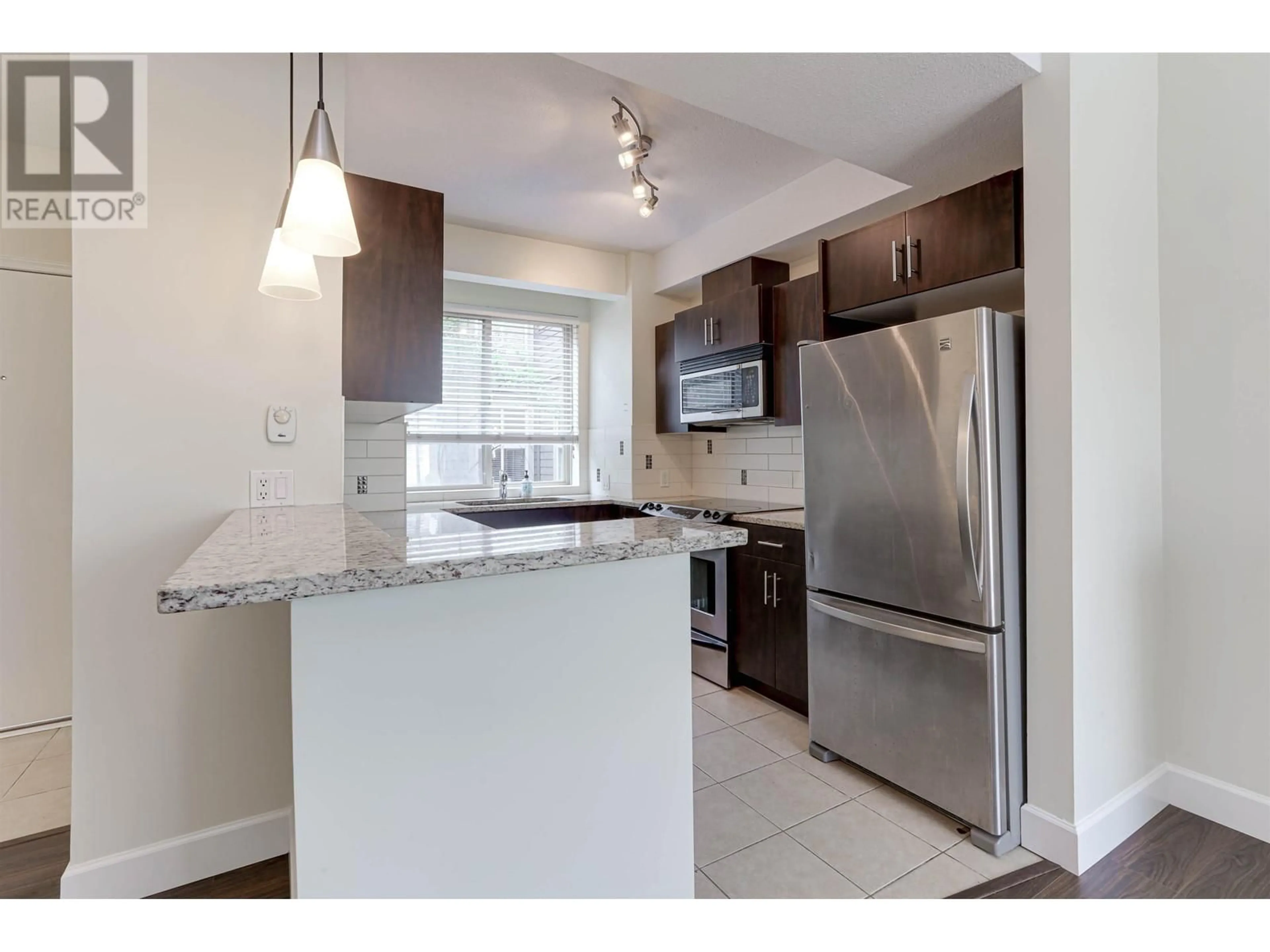 Standard kitchen, ceramic/tile floor for 235 2108 ROWLAND STREET, Port Coquitlam British Columbia V3C0C1