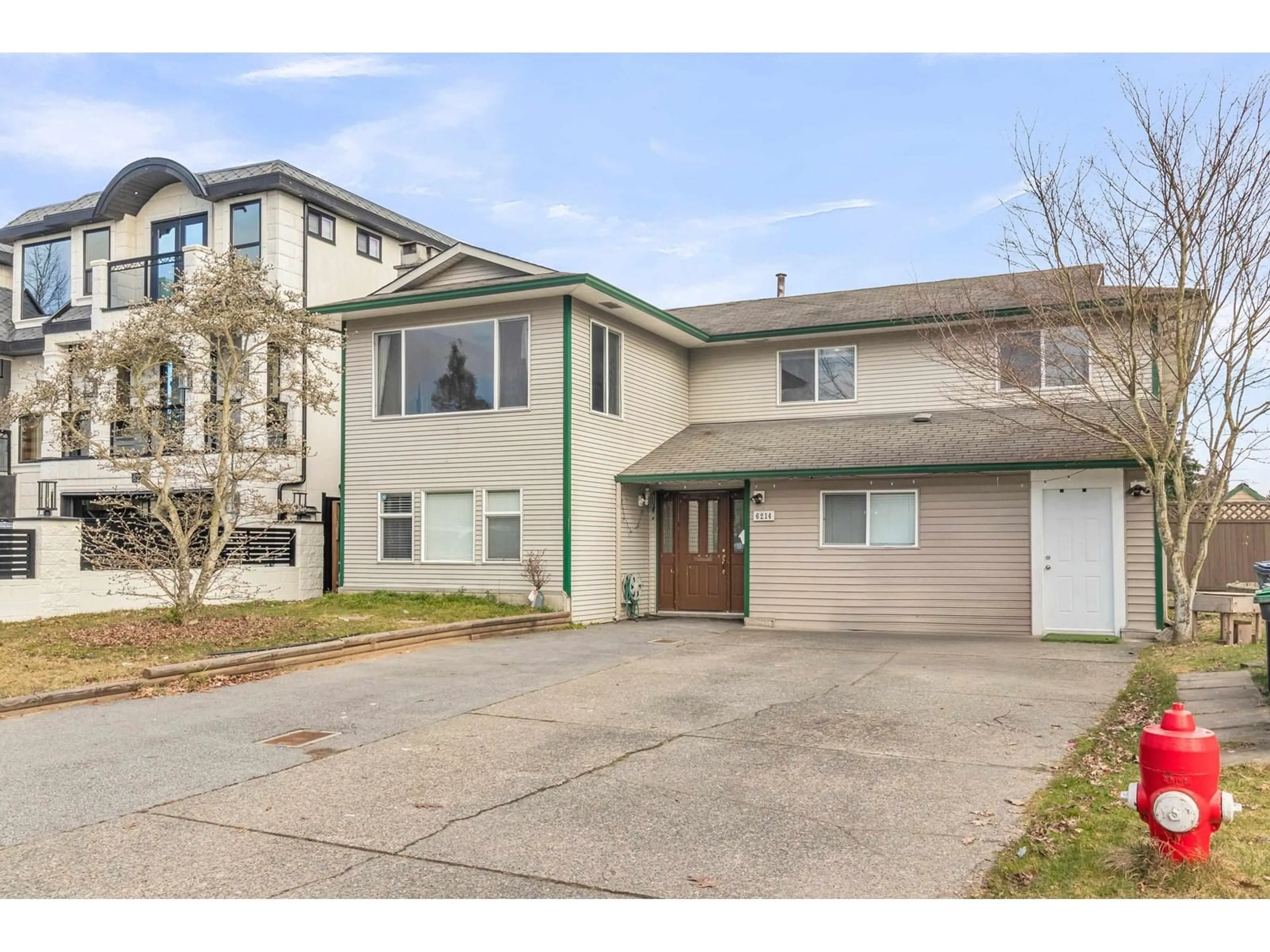 Home with vinyl exterior material, street for 6214 129 STREET, Surrey British Columbia V3X1S6