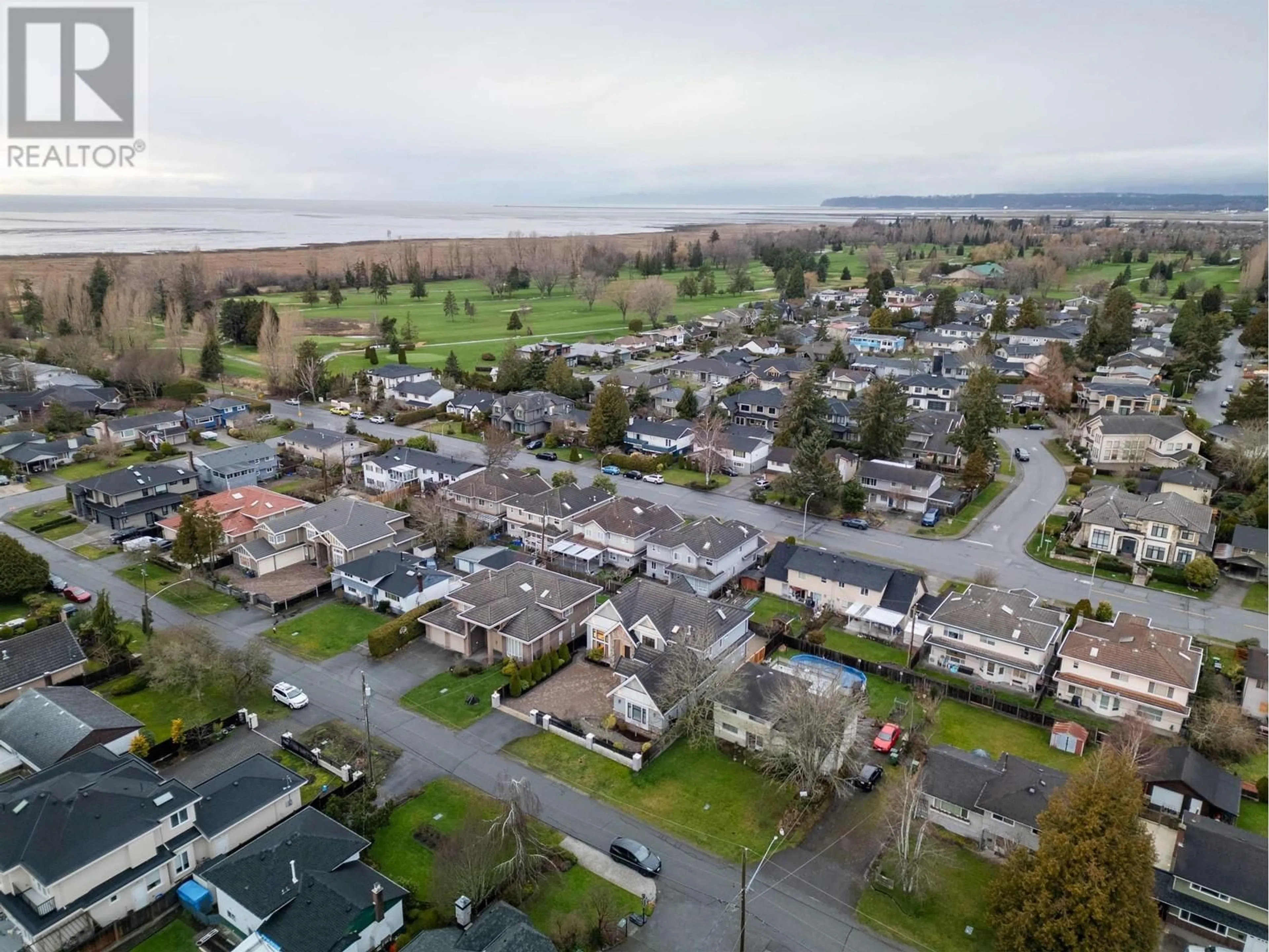 A pic from outside/outdoor area/front of a property/back of a property/a pic from drone, street for 3471 NEWMORE AVENUE, Richmond British Columbia V7C1M5