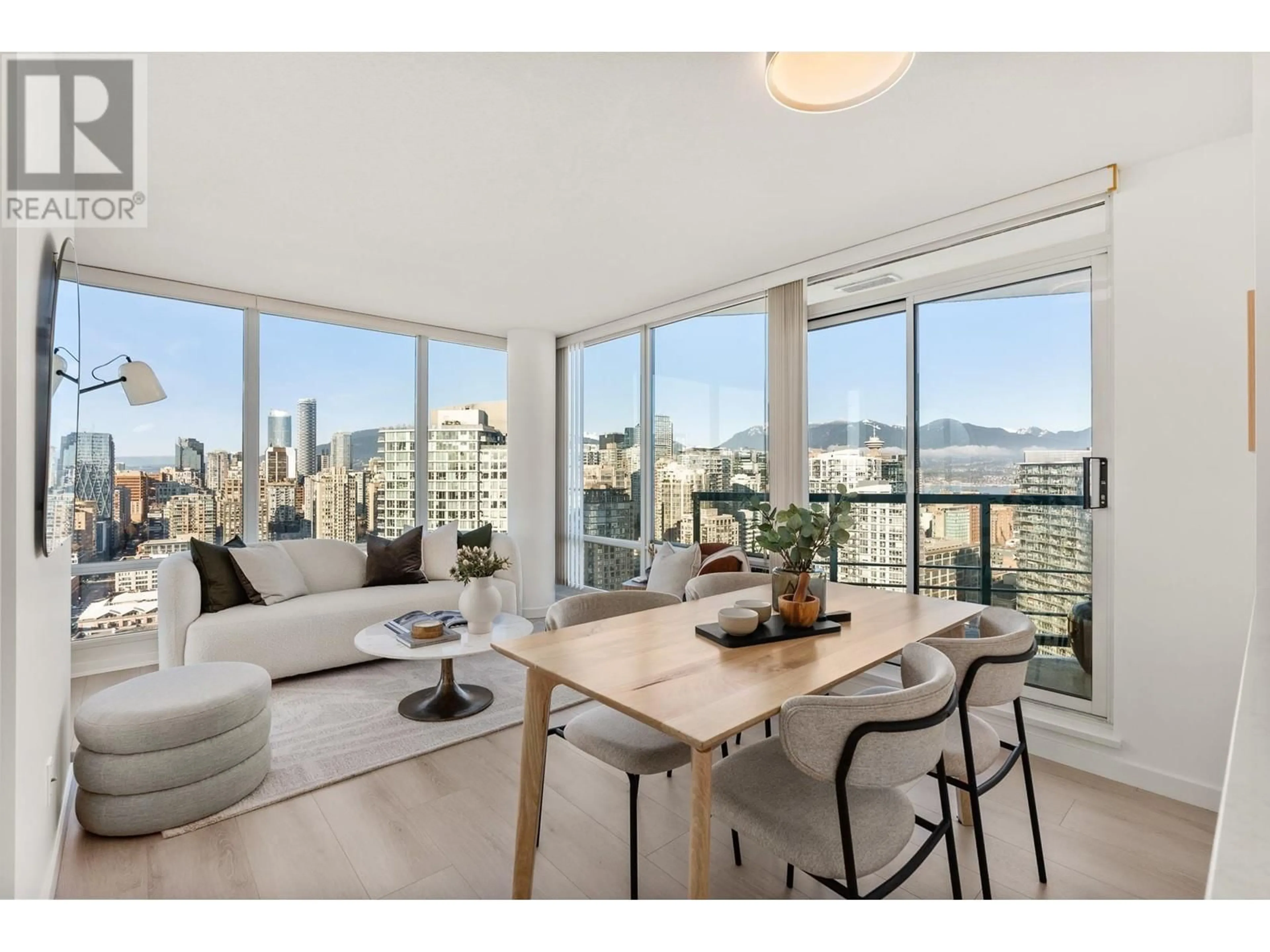 Living room with furniture, wood/laminate floor for 3601 1033 MARINASIDE CRESCENT, Vancouver British Columbia V6Z3A3