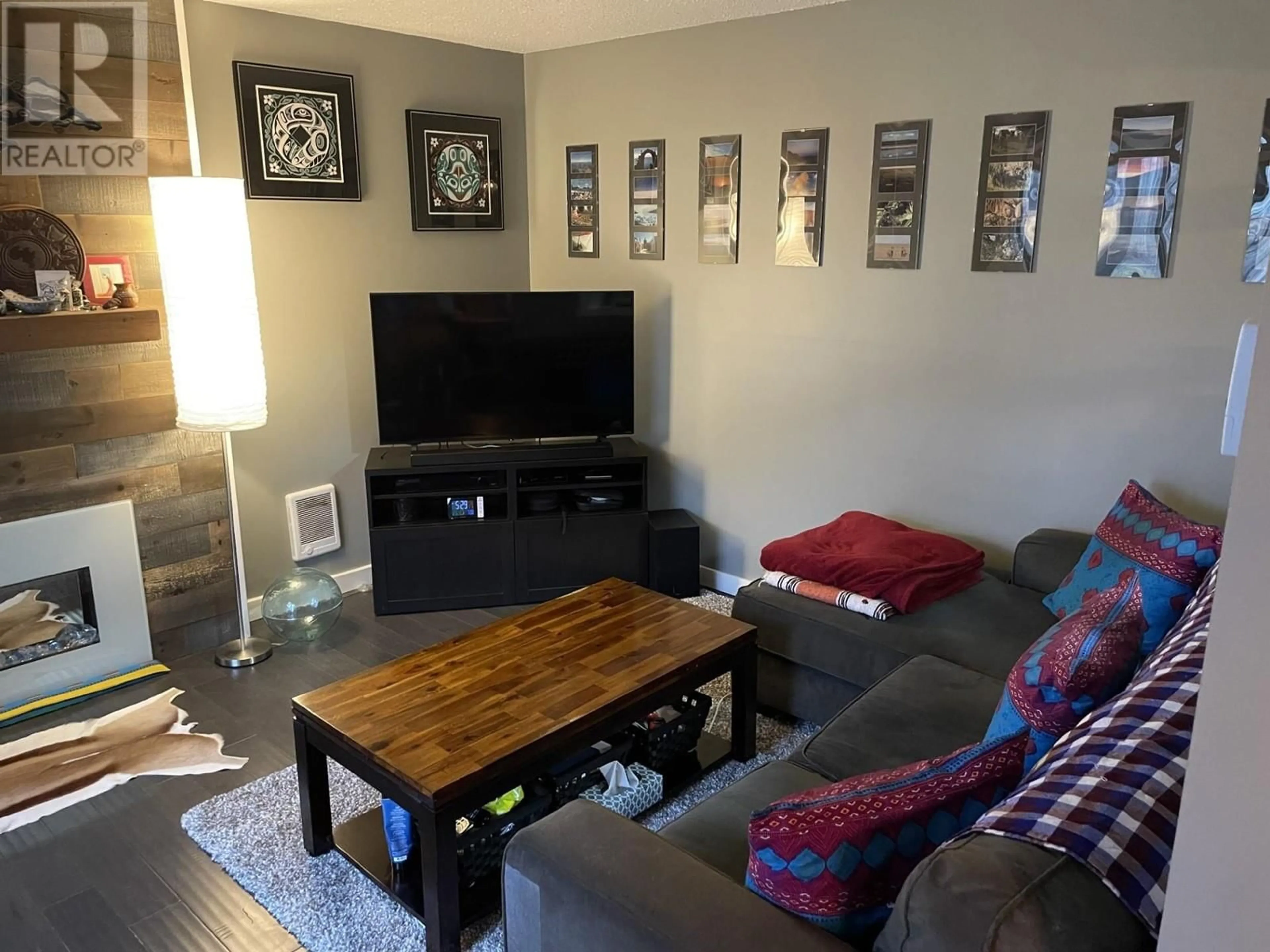 Living room with furniture, wood/laminate floor for 16 4832 LAZELLE AVENUE, Terrace British Columbia V8G1T4