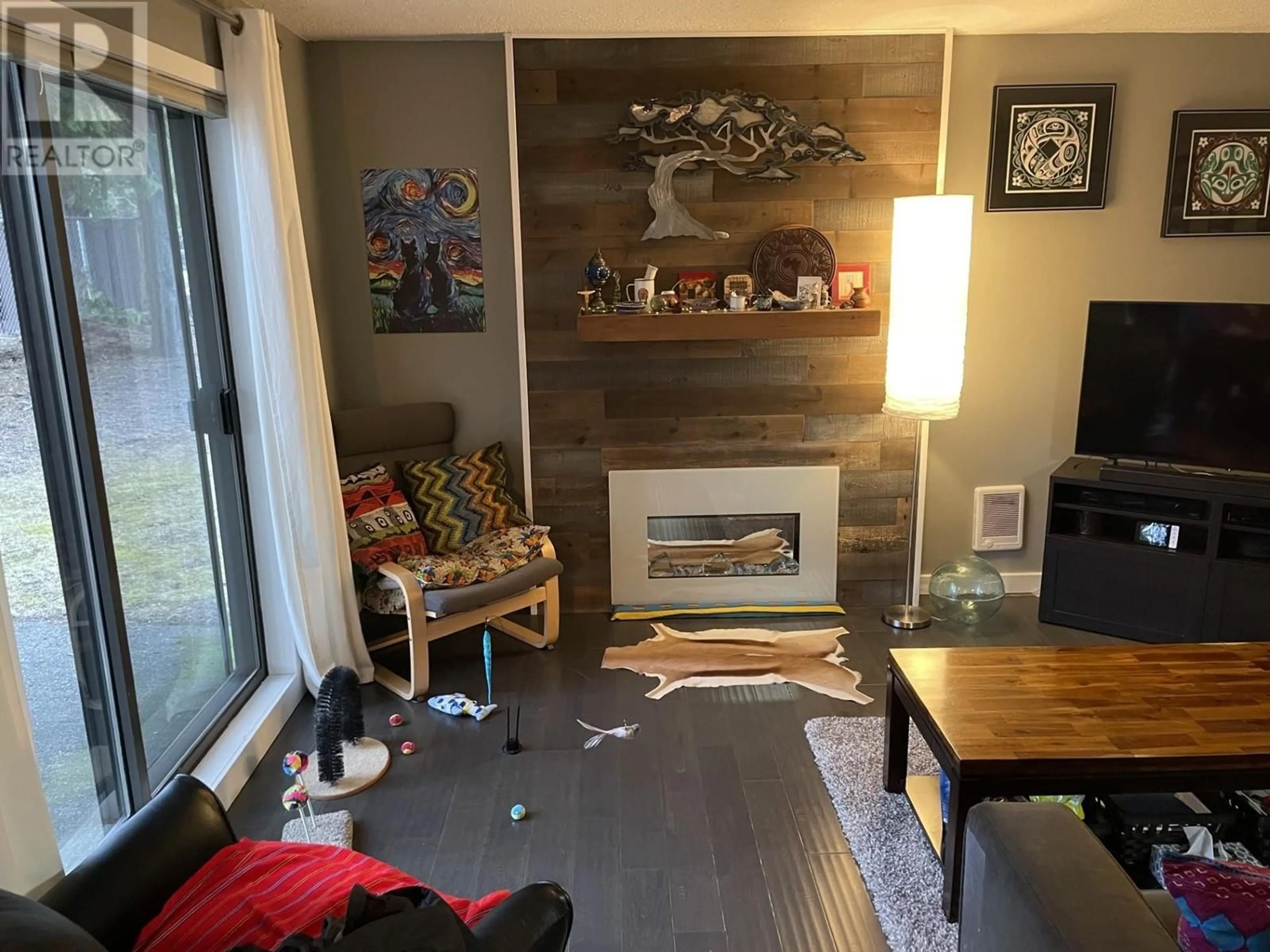 Living room with furniture, wood/laminate floor for 16 4832 LAZELLE AVENUE, Terrace British Columbia V8G1T4