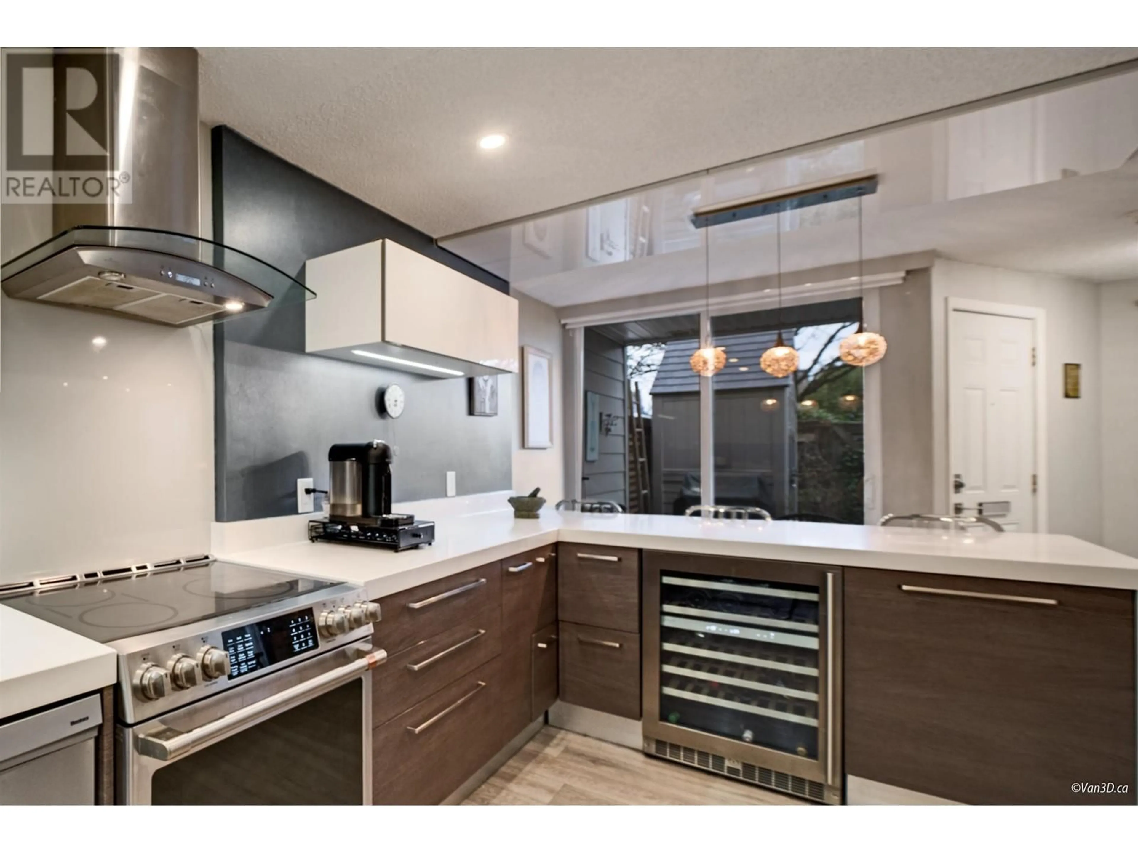 Contemporary kitchen, ceramic/tile floor for 3903 PENDER STREET, Burnaby British Columbia V5C2L7