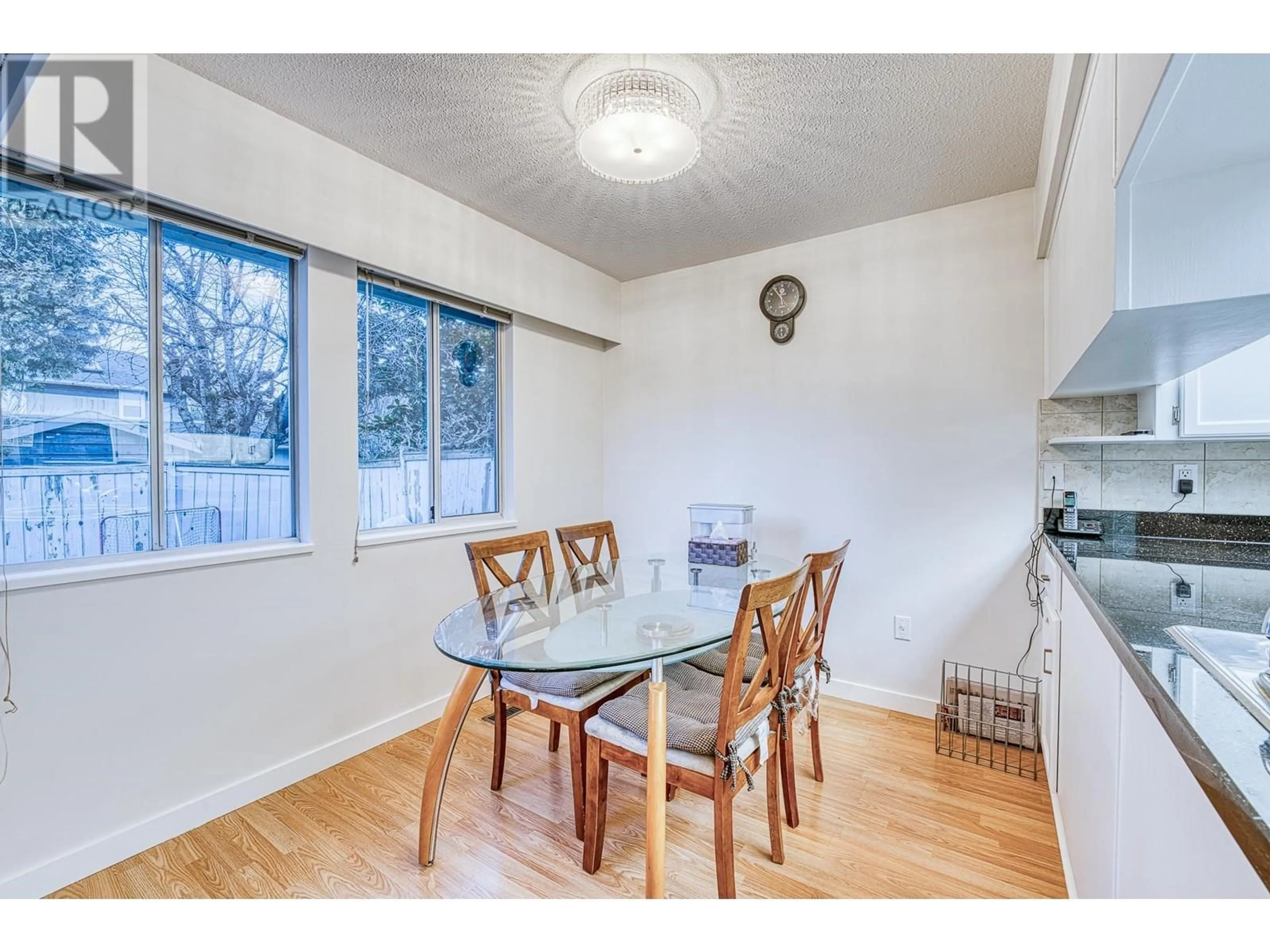 Dining room, wood/laminate floor for 5591 JASKOW DRIVE, Richmond British Columbia V7E5W4