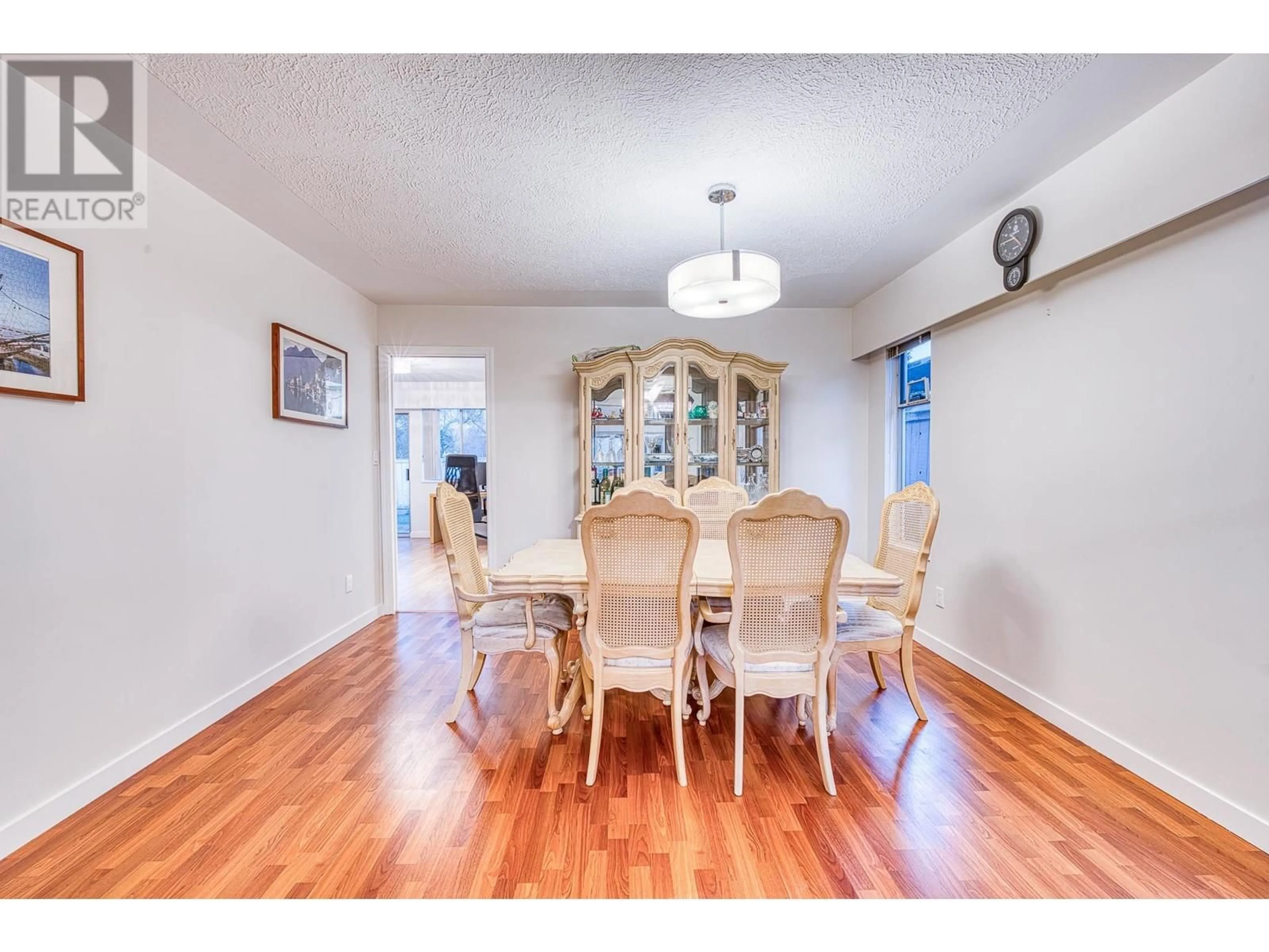 Dining room, wood/laminate floor for 5591 JASKOW DRIVE, Richmond British Columbia V7E5W4