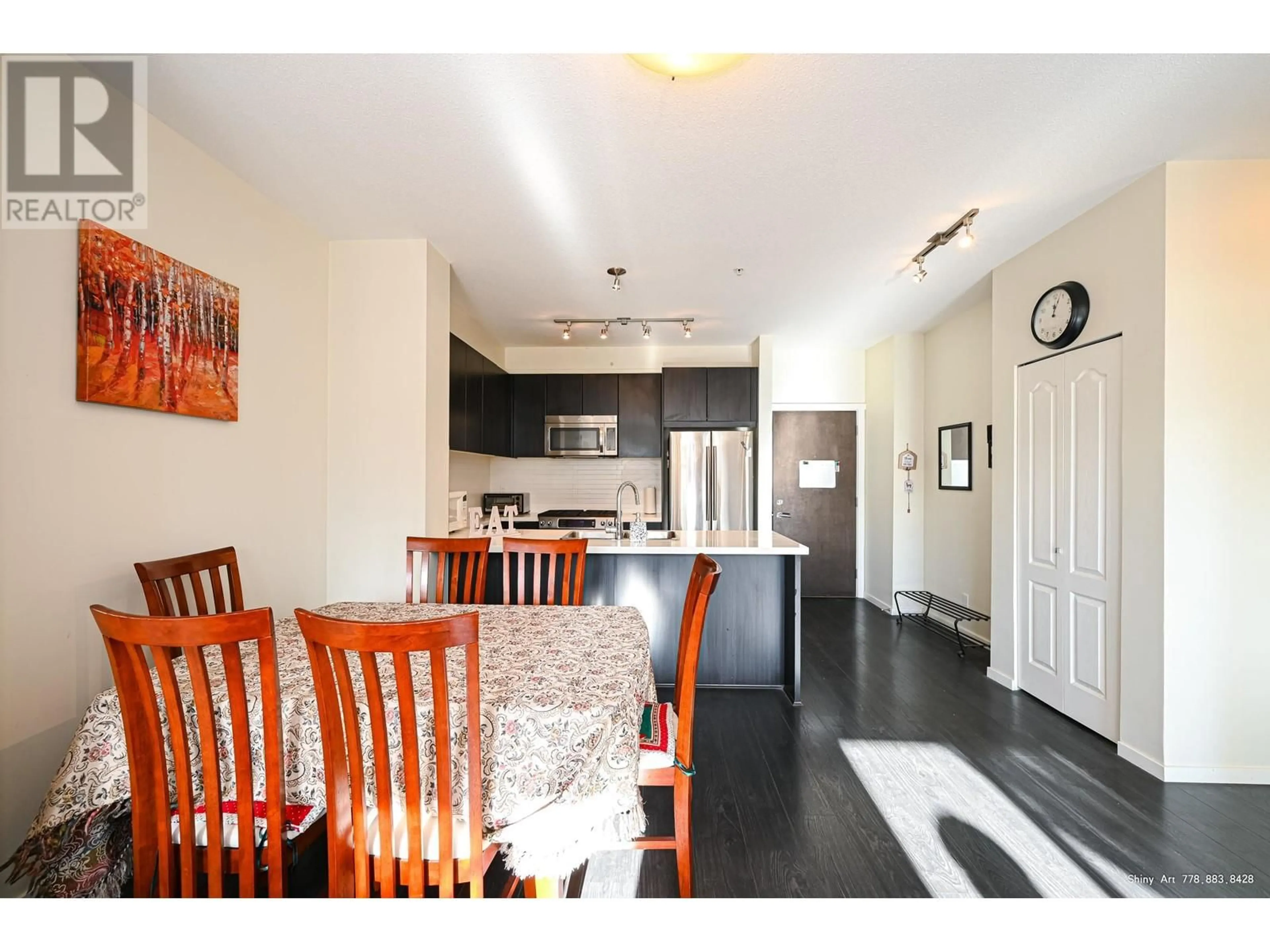 Open concept kitchen, wood/laminate floor for 301 - 3107 WINDSOR GATE, Coquitlam British Columbia V3B0L1