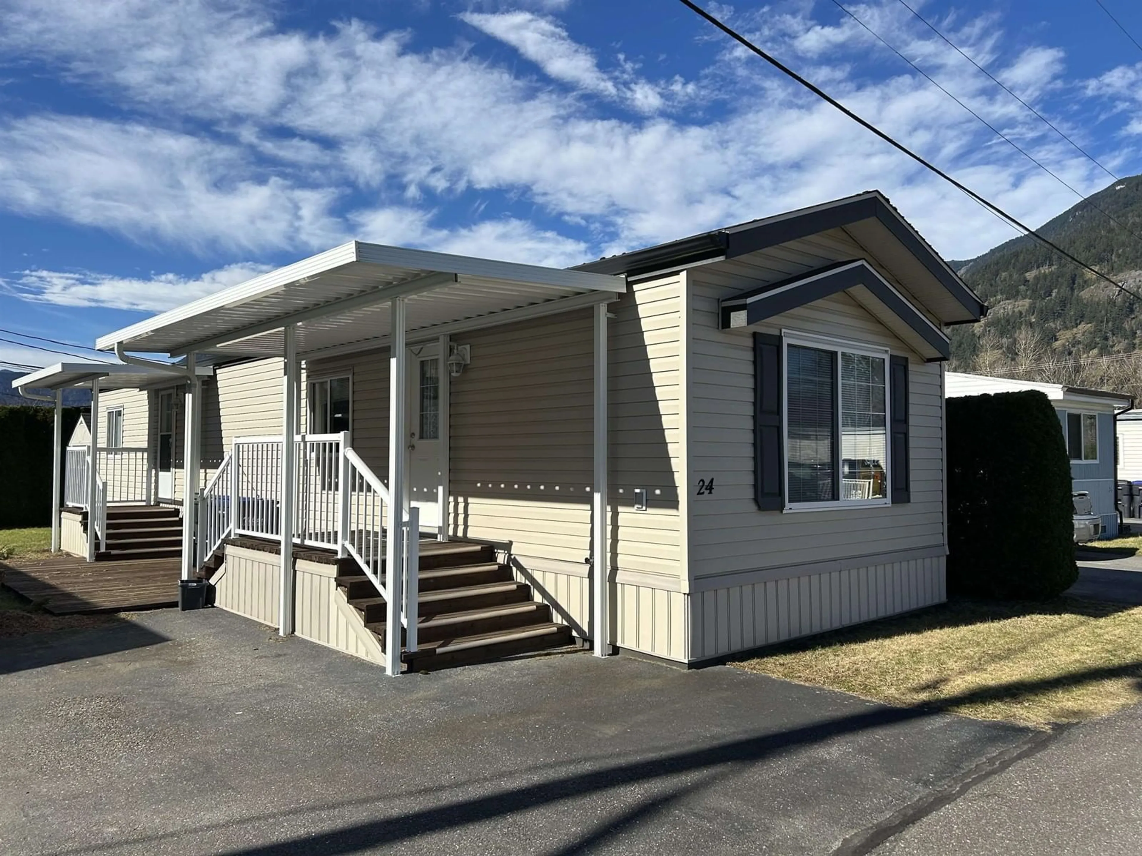 Home with vinyl exterior material, street for 24 62780 FLOOD HOPE ROAD|Hope, Hope British Columbia V0X1L2