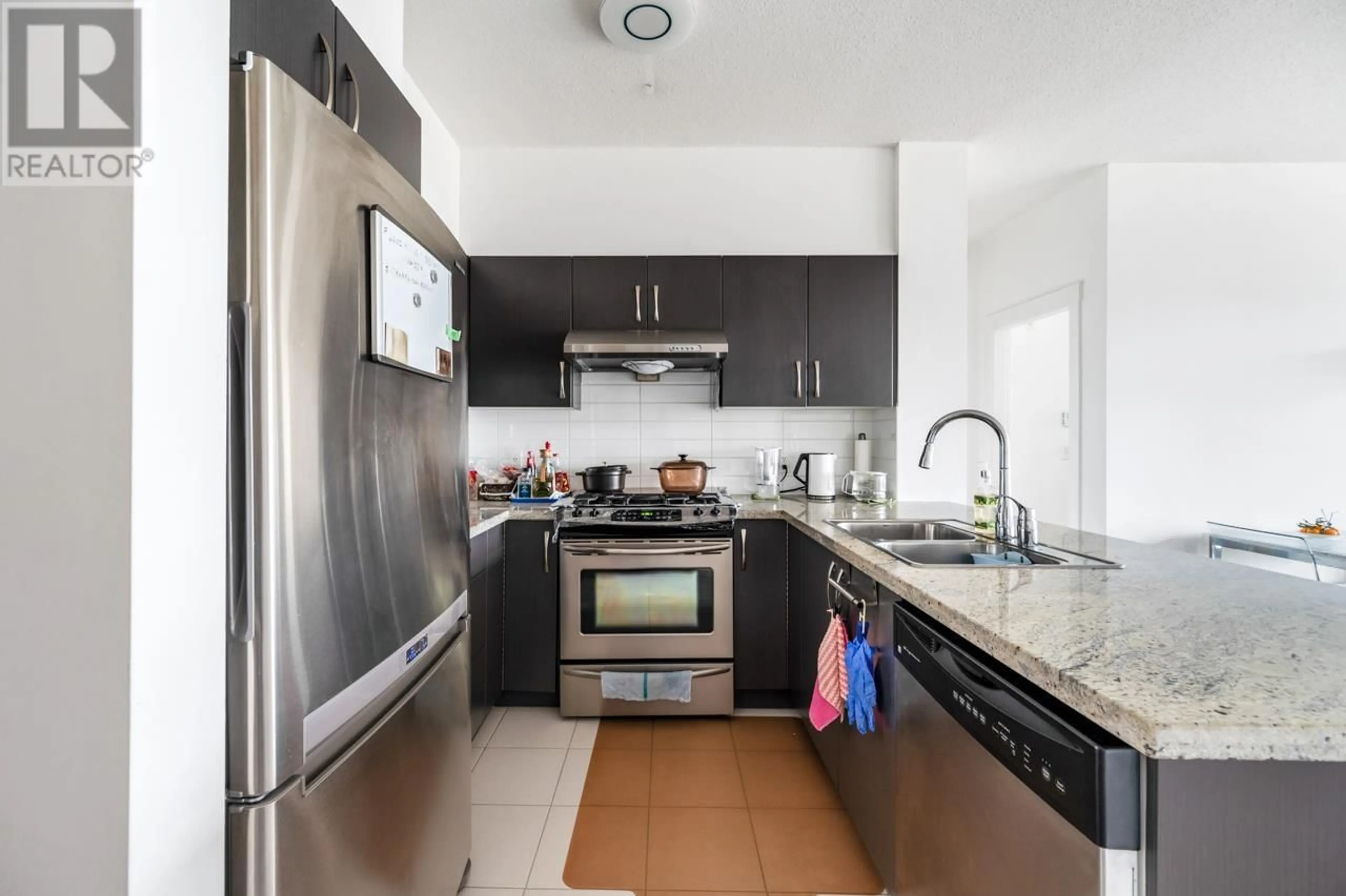 Standard kitchen, ceramic/tile floor for 402 - 9199 TOMICKI AVENUE, Richmond British Columbia V6X0C4
