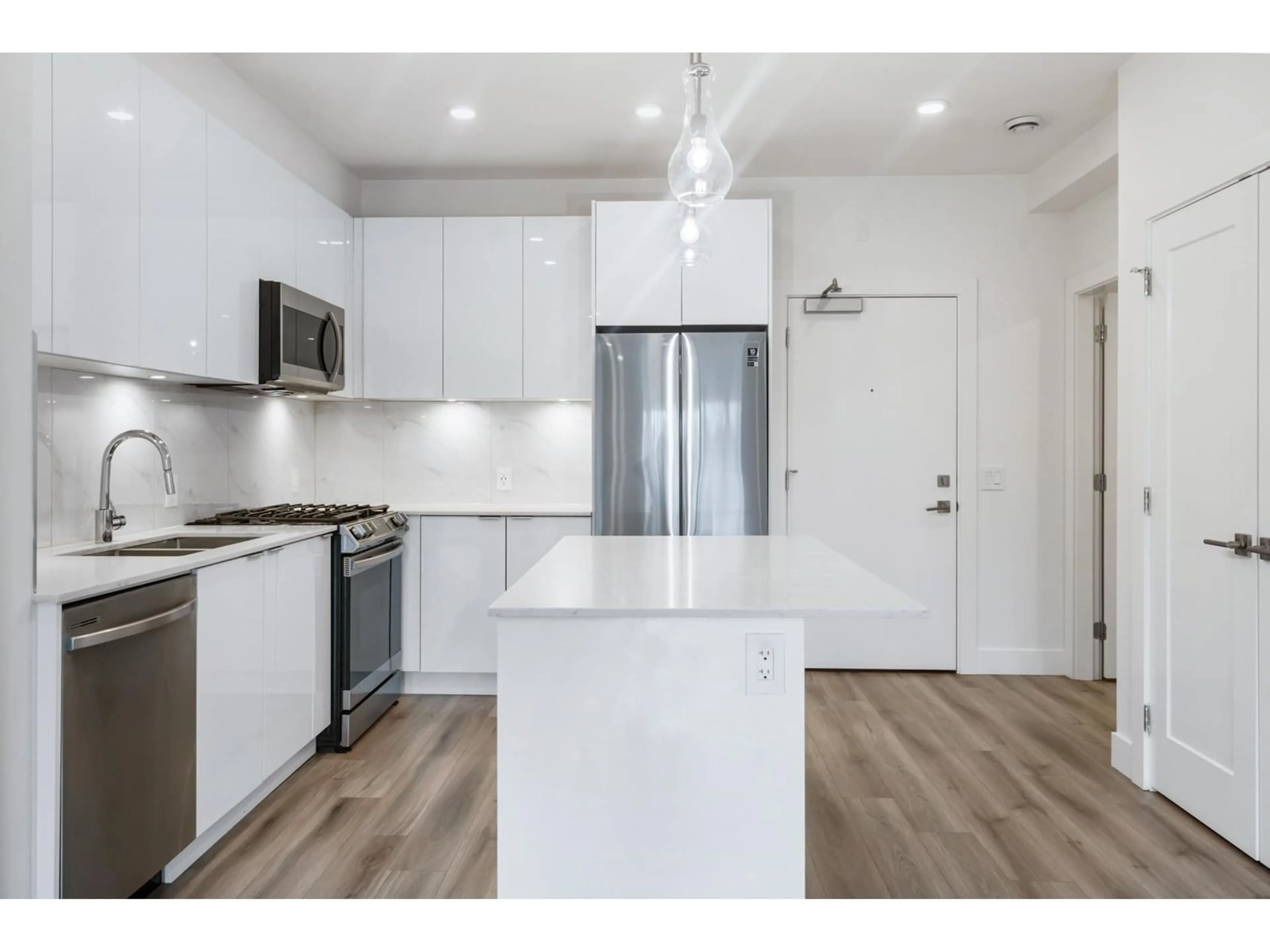 Open concept kitchen, unknown for B310 - 8447 202, Langley British Columbia V2Y2B7