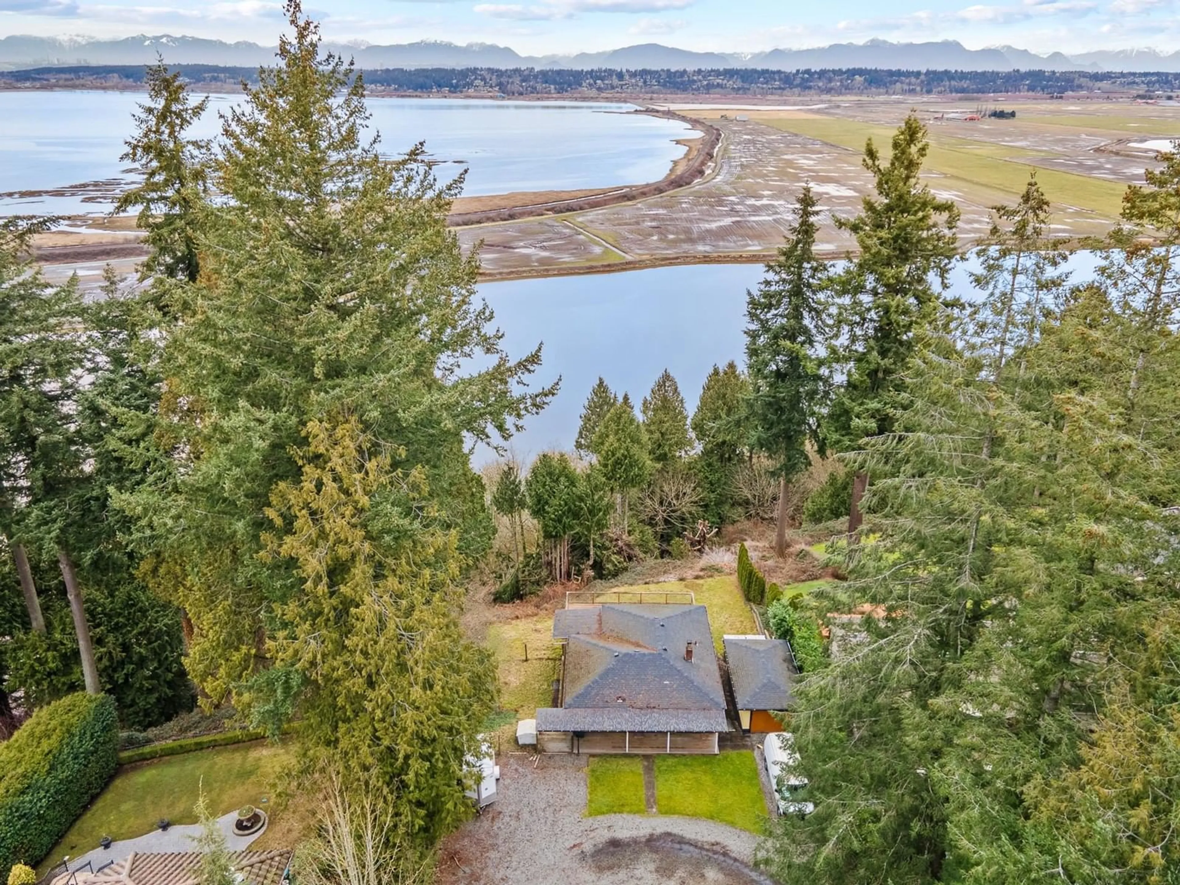 A pic from outside/outdoor area/front of a property/back of a property/a pic from drone, water/lake/river/ocean view for 13021 CRESCENT, Surrey British Columbia V4P1J6