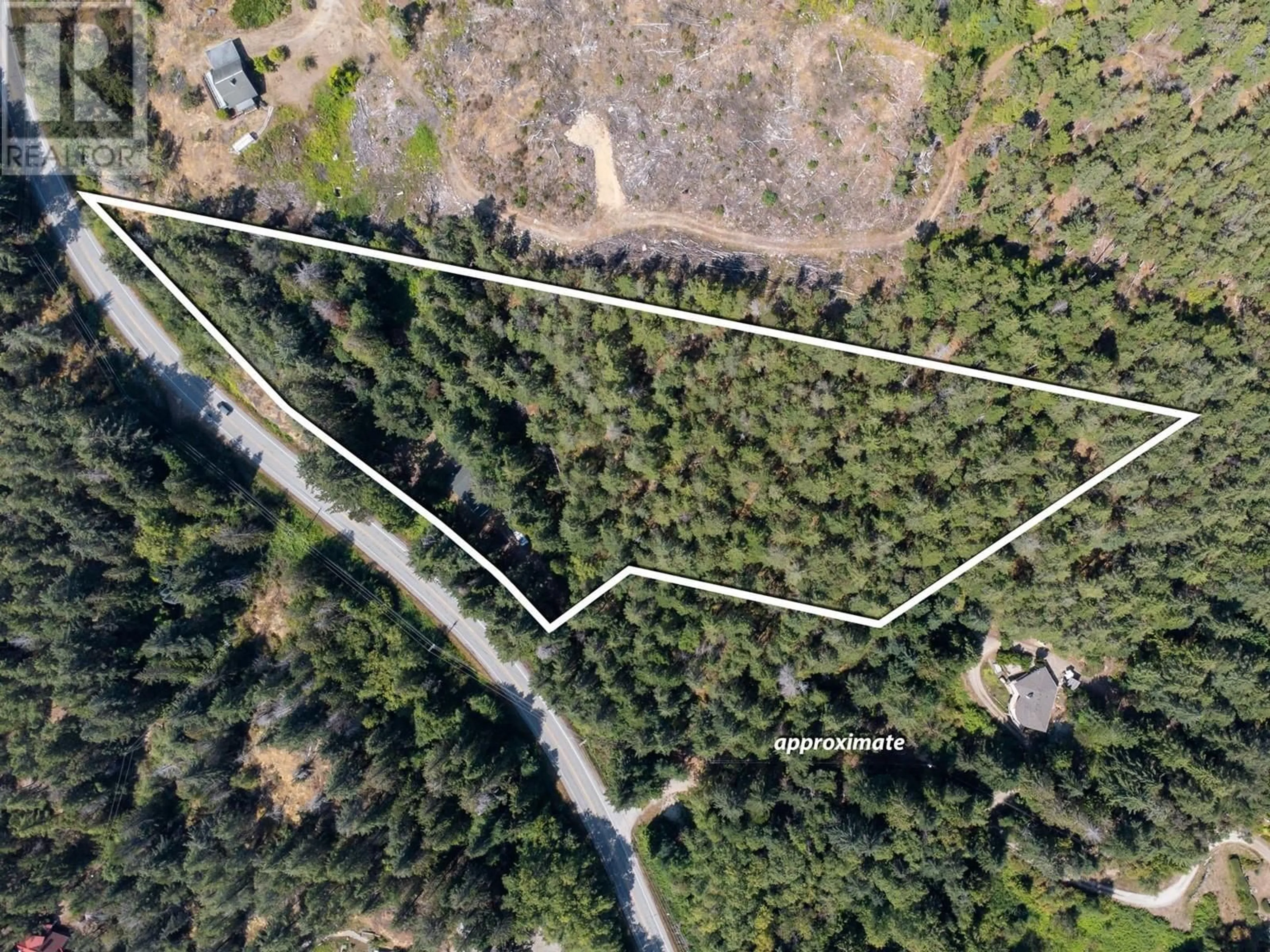 A pic from outside/outdoor area/front of a property/back of a property/a pic from drone, forest/trees view for 11022 SUNSHINE COAST HIGHWAY, Halfmoon Bay British Columbia V7Z1B9
