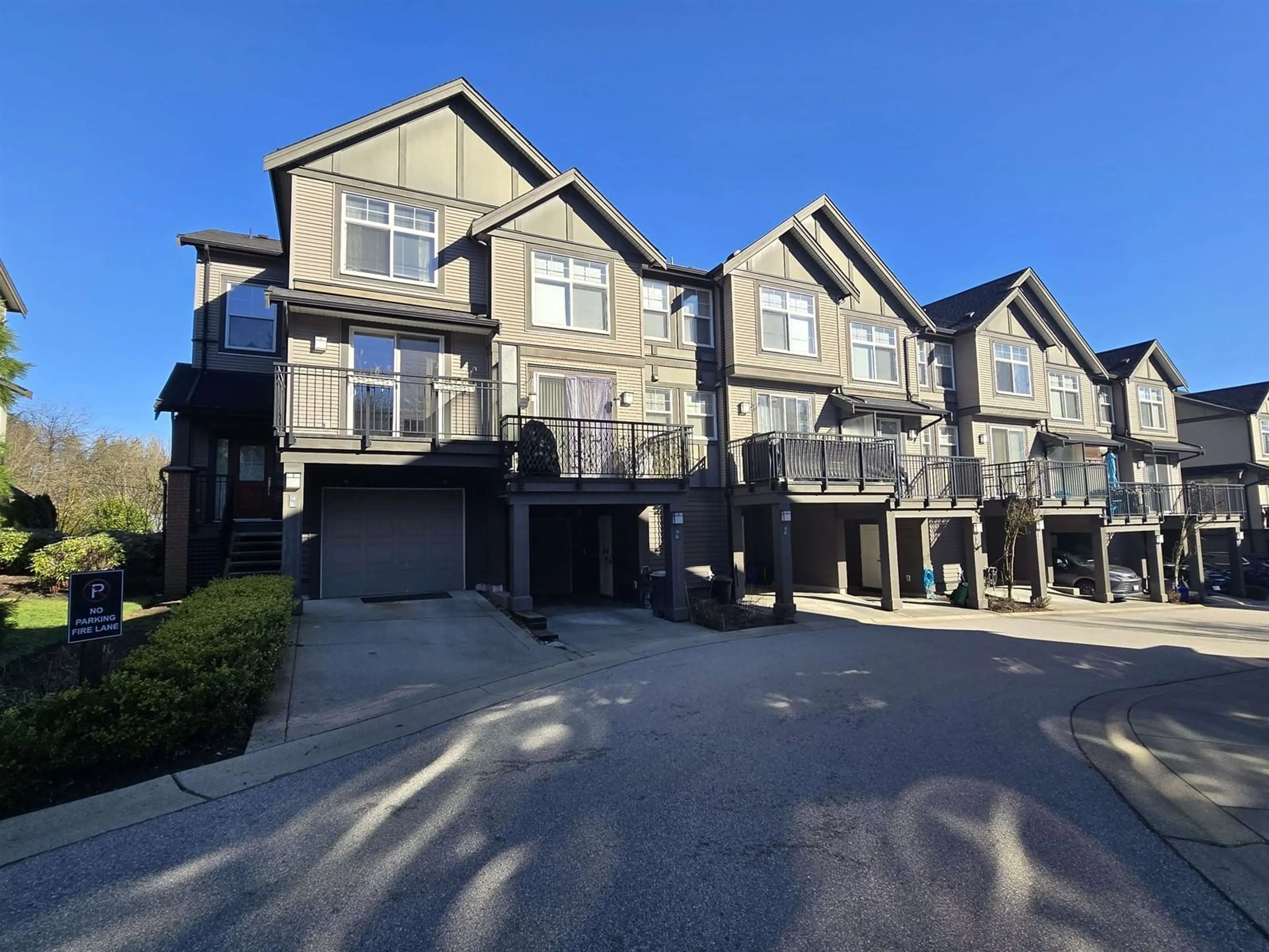 A pic from outside/outdoor area/front of a property/back of a property/a pic from drone, street for 14 15788 104 AVENUE, Surrey British Columbia V4N6M6