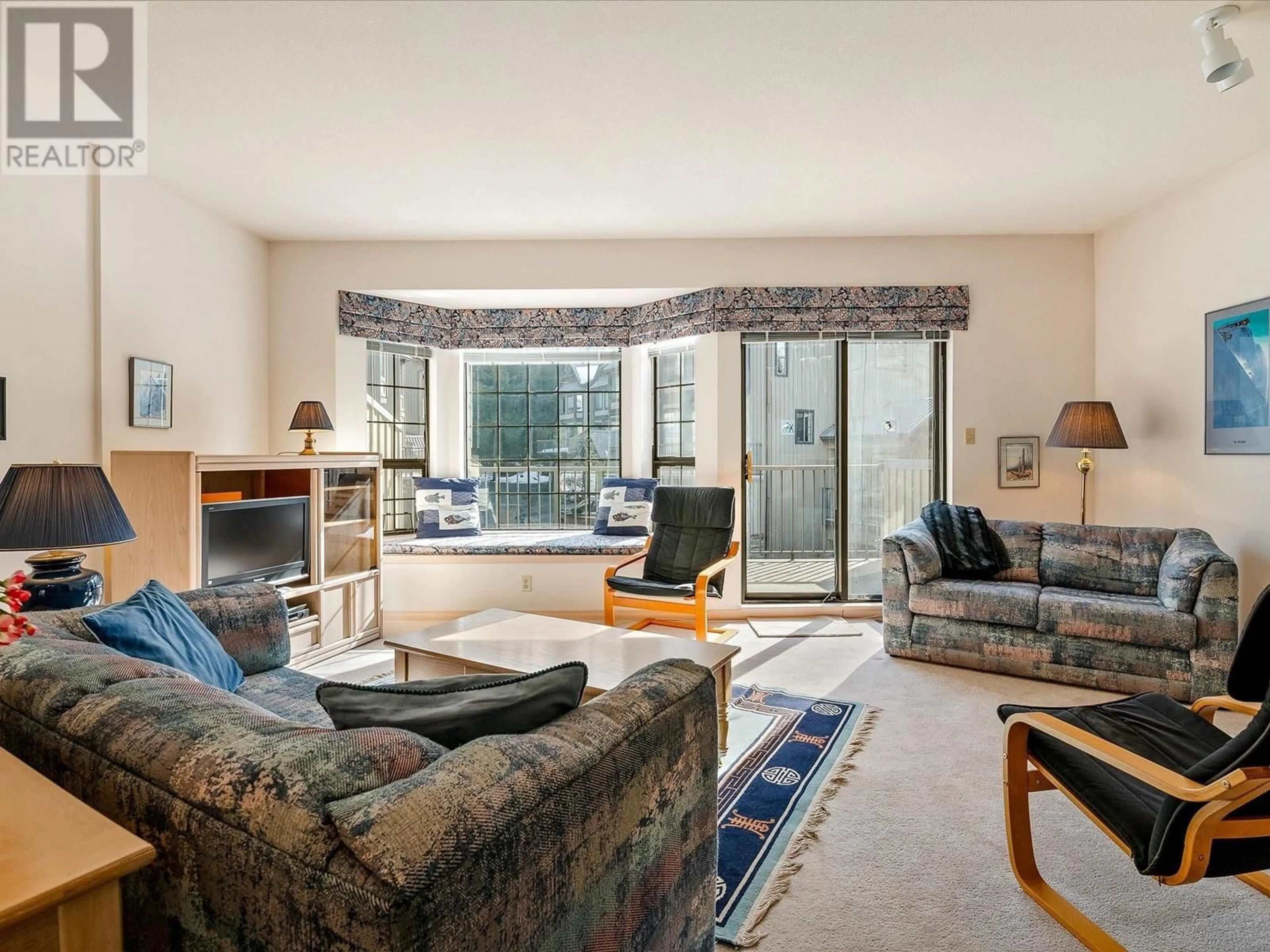 Living room with furniture, unknown for 13 2104 NORDIC DRIVE, Whistler British Columbia V8E0P1