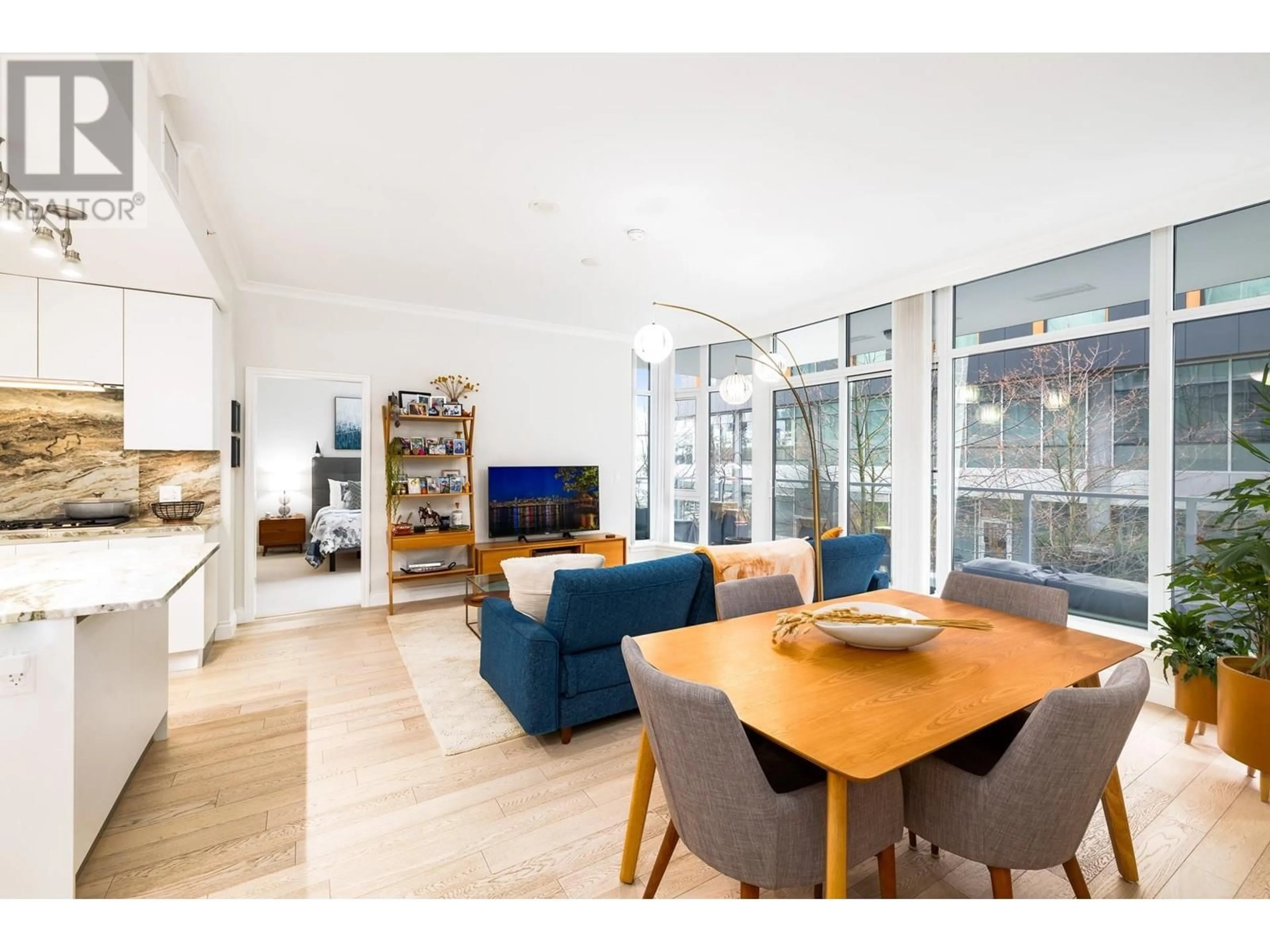 Living room with furniture, unknown for 207 - 175 VICTORY SHIP WAY, North Vancouver British Columbia V7L0G1