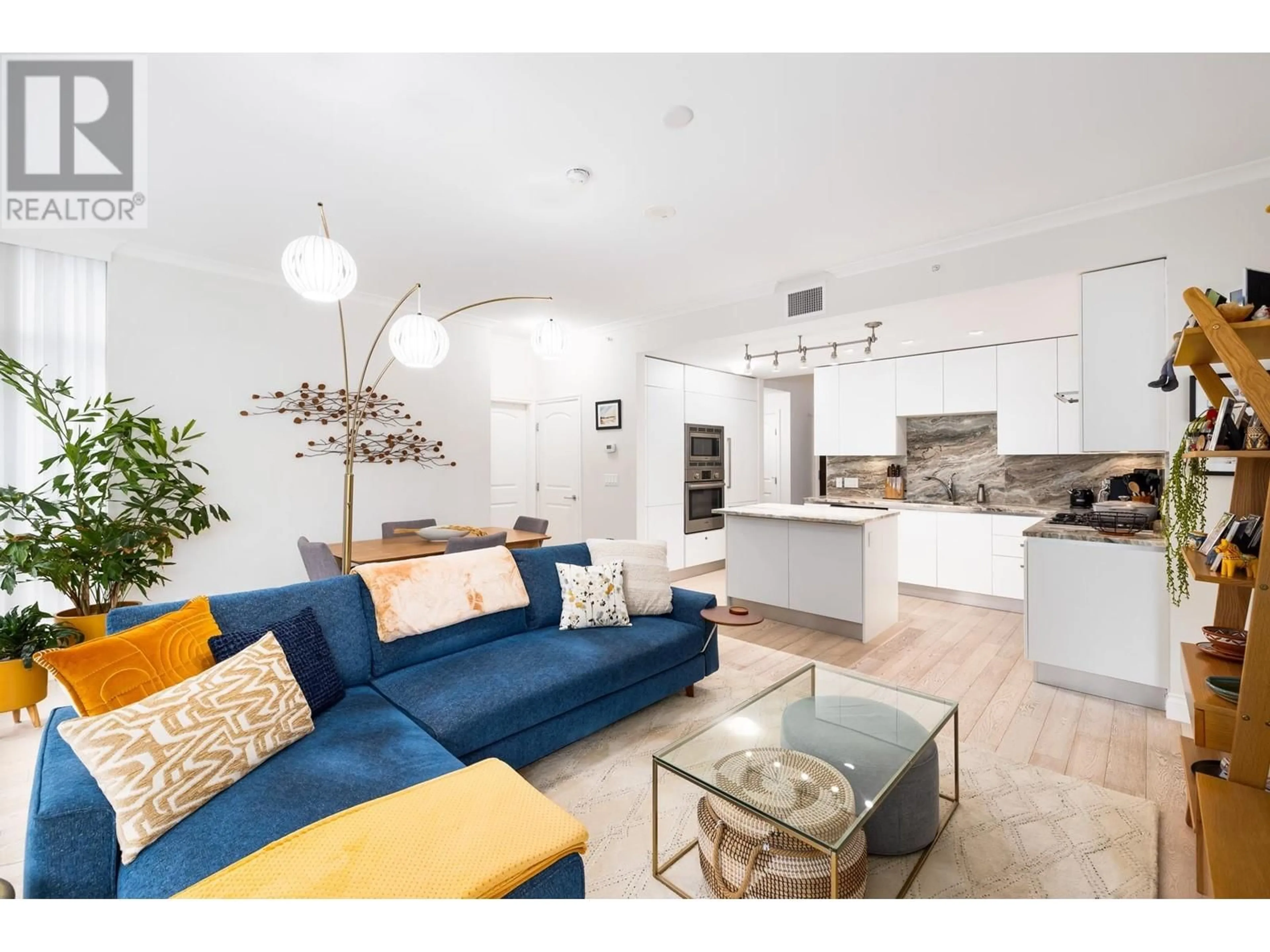 Open concept kitchen, unknown for 207 - 175 VICTORY SHIP WAY, North Vancouver British Columbia V7L0G1