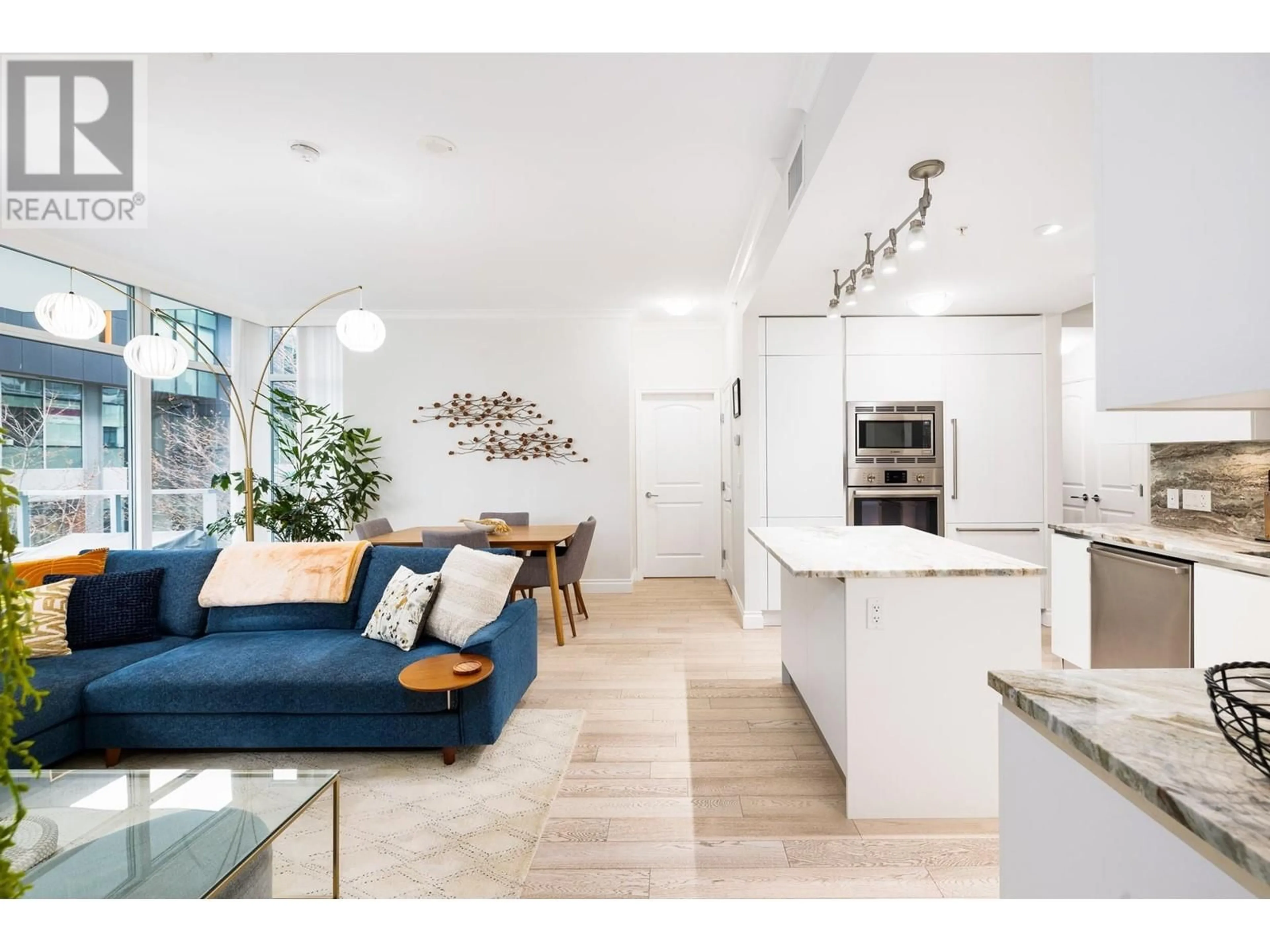 Open concept kitchen, unknown for 207 - 175 VICTORY SHIP WAY, North Vancouver British Columbia V7L0G1