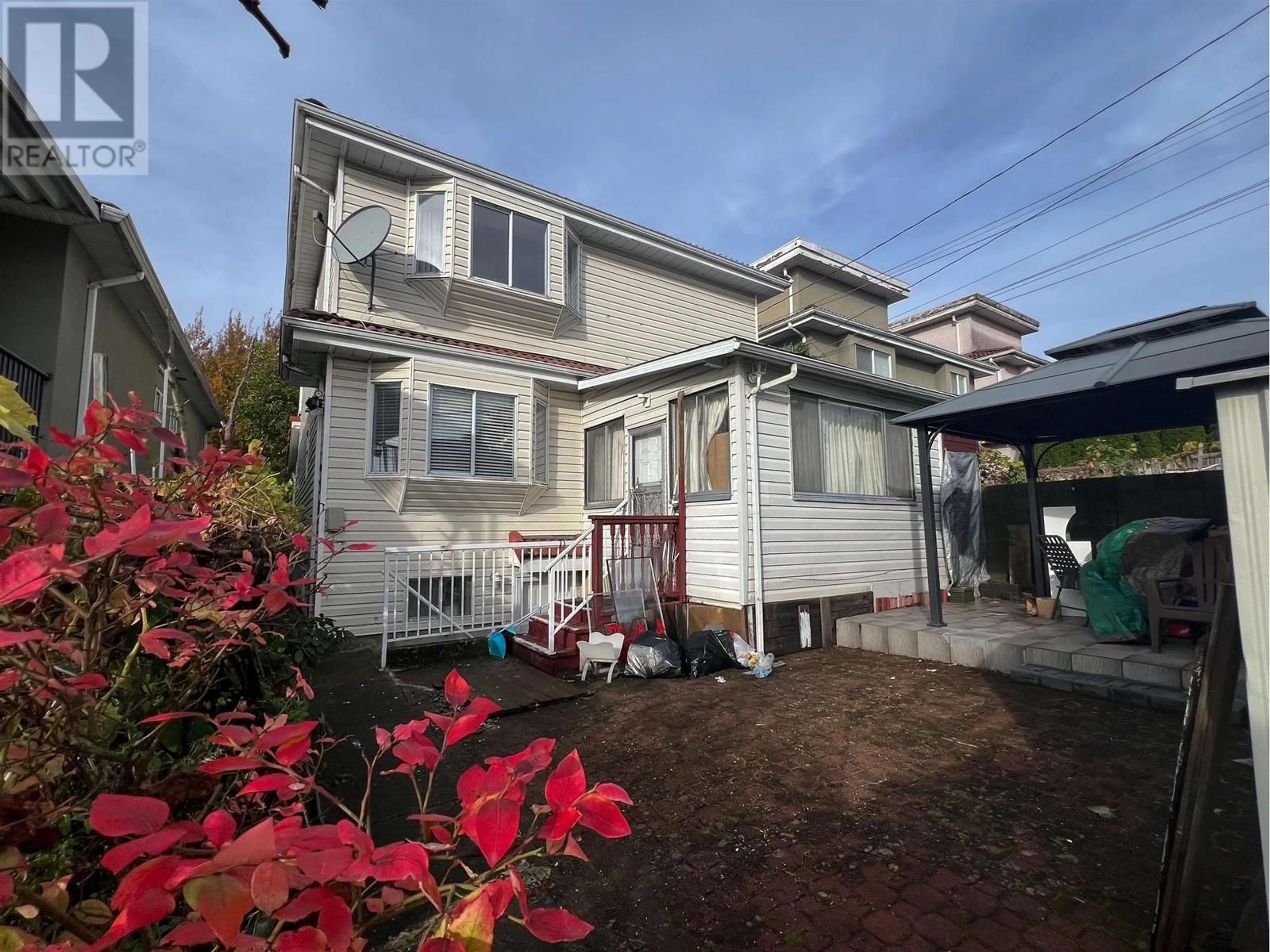 A pic from outside/outdoor area/front of a property/back of a property/a pic from drone, street for 8006 CHESTER STREET, Vancouver British Columbia V5X3Y6