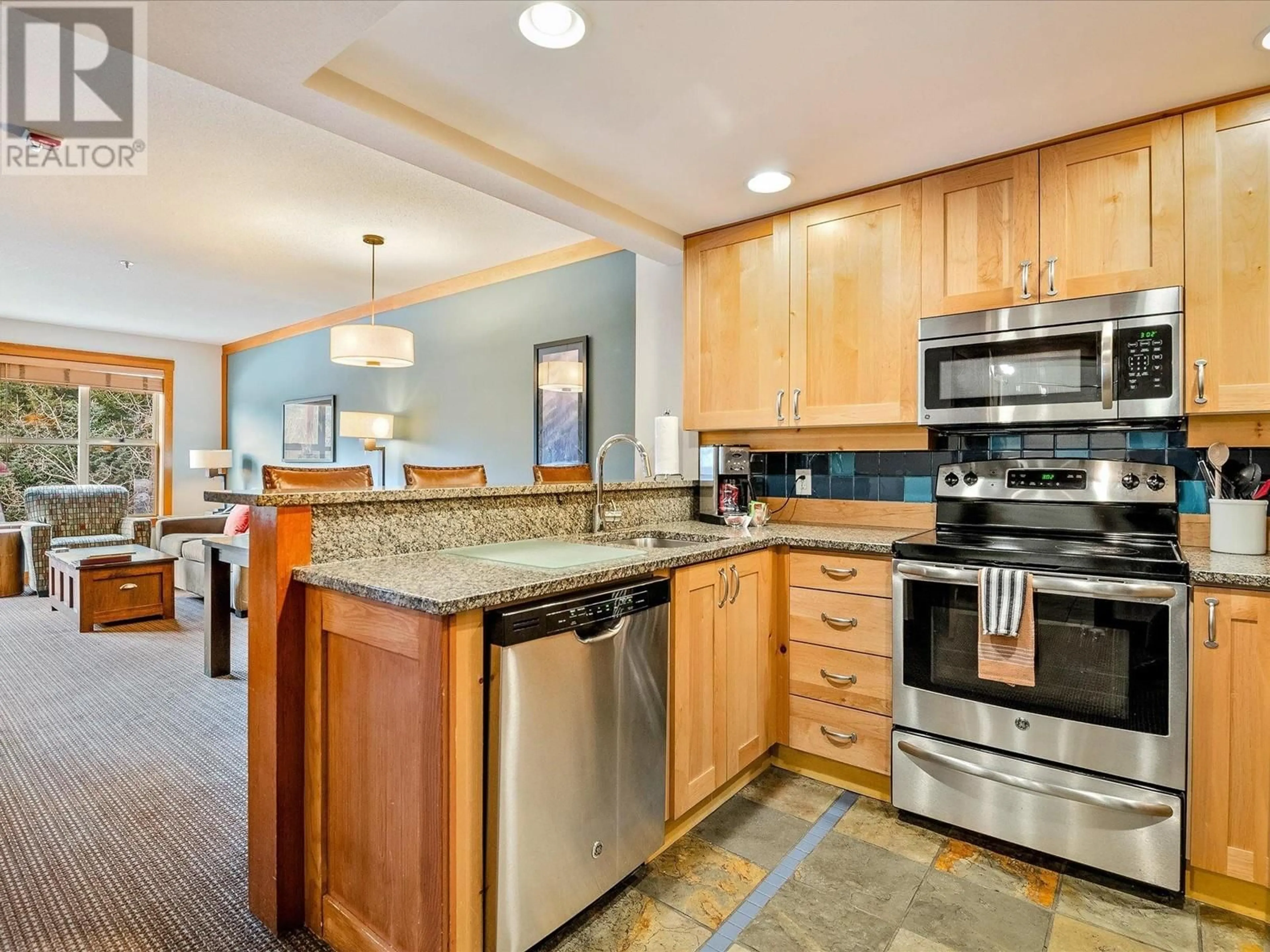 Open concept kitchen, ceramic/tile floor for 210A - 2036 LONDON LANE, Whistler British Columbia V8E0N7