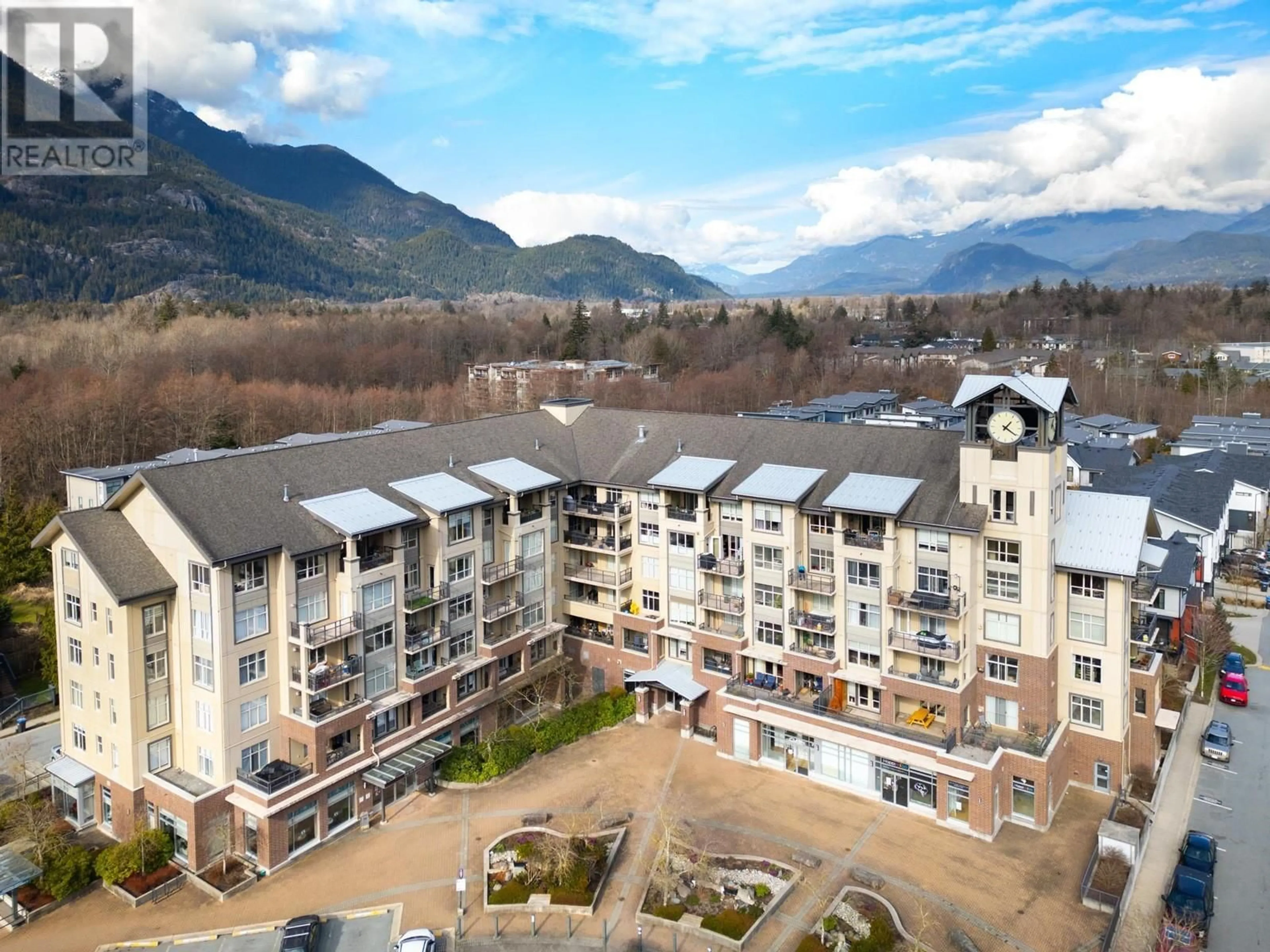 A pic from outside/outdoor area/front of a property/back of a property/a pic from drone, mountain view for 309 1211 VILLAGE GREEN WAY, Squamish British Columbia V8B0R7