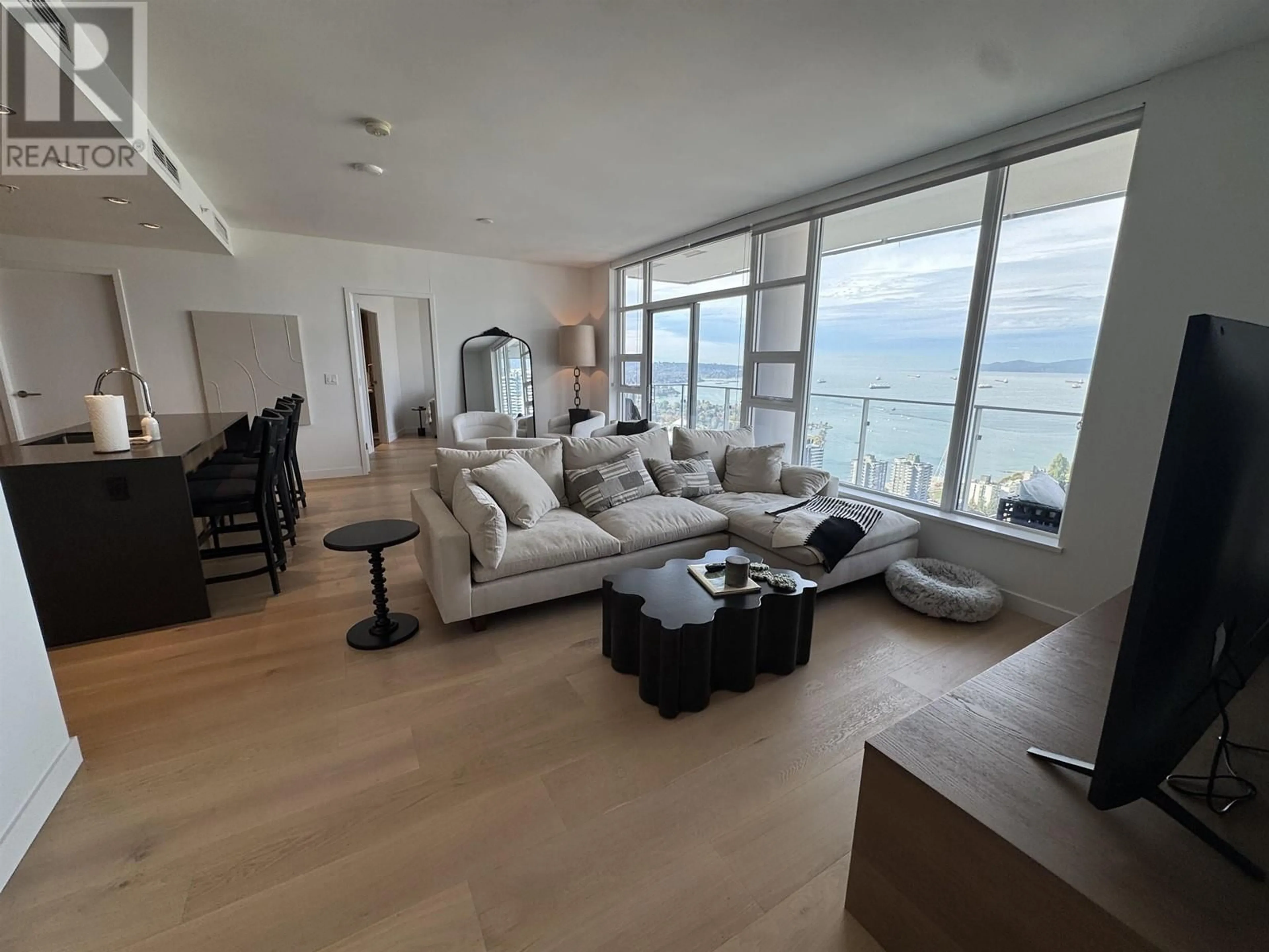Living room with furniture, floor is not visible for 4701 - 1289 HORNBY STREET, Vancouver British Columbia V6Z0G7