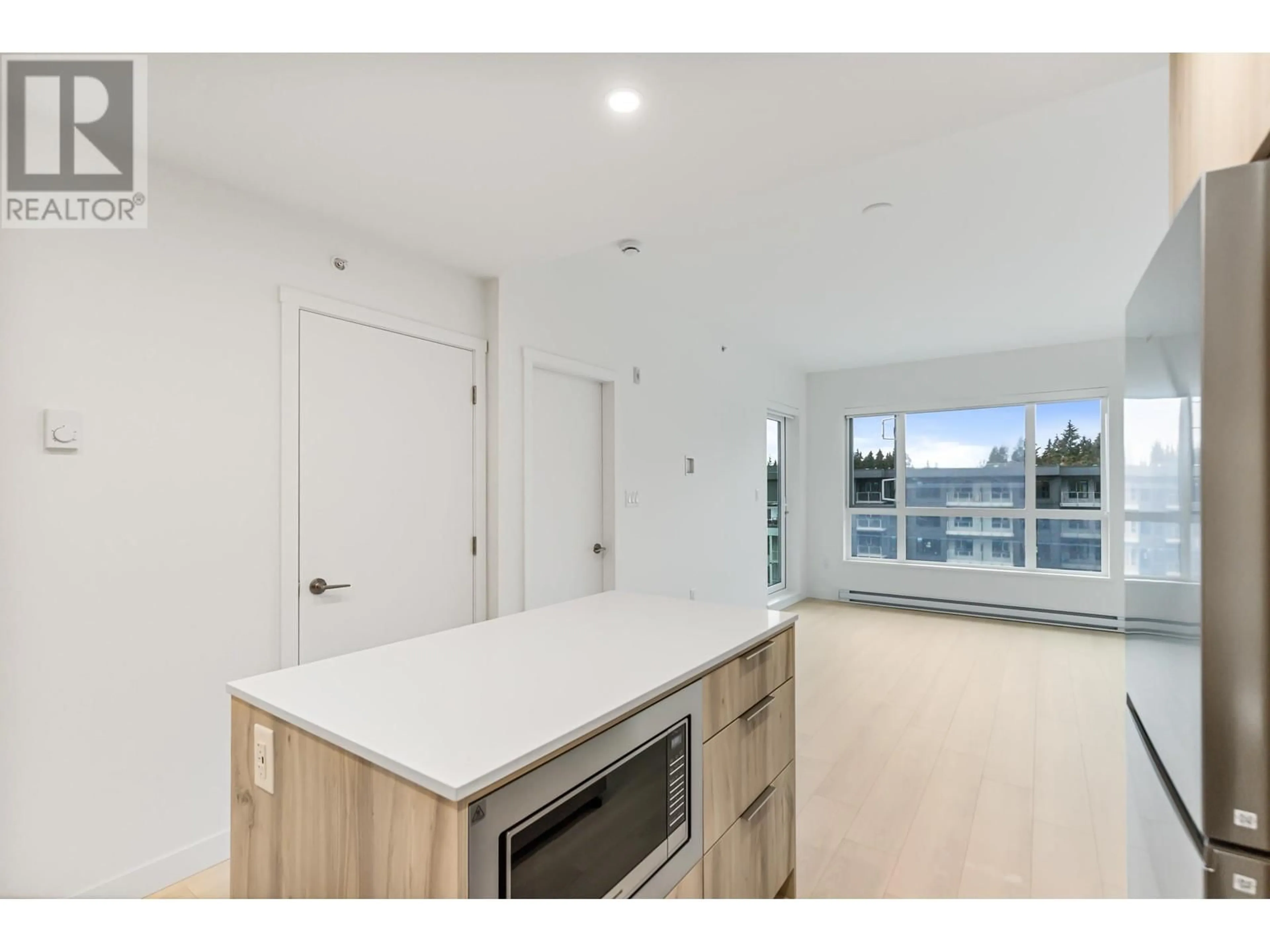 Open concept kitchen, unknown for 603 - 3596 MALSUM DRIVE, North Vancouver British Columbia V7G0B5