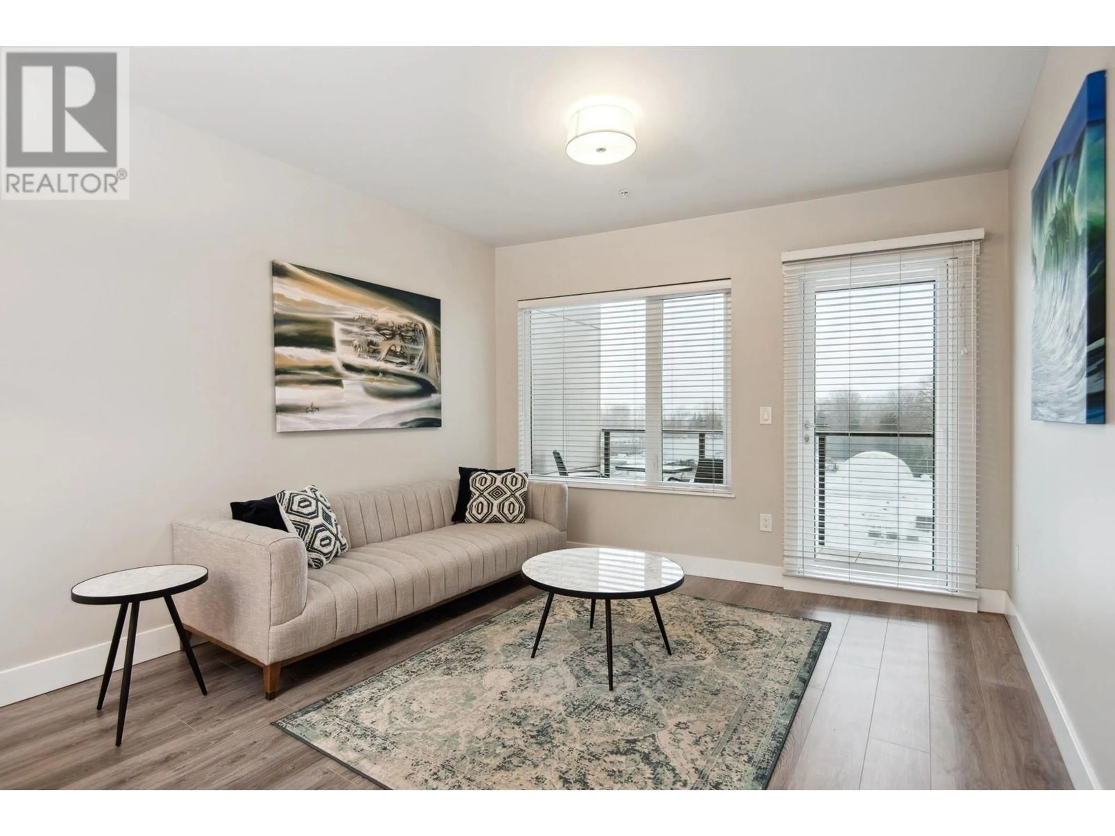 Living room with furniture, wood/laminate floor for 603 - 1496 CHARLOTTE ROAD, North Vancouver British Columbia V7J0C9