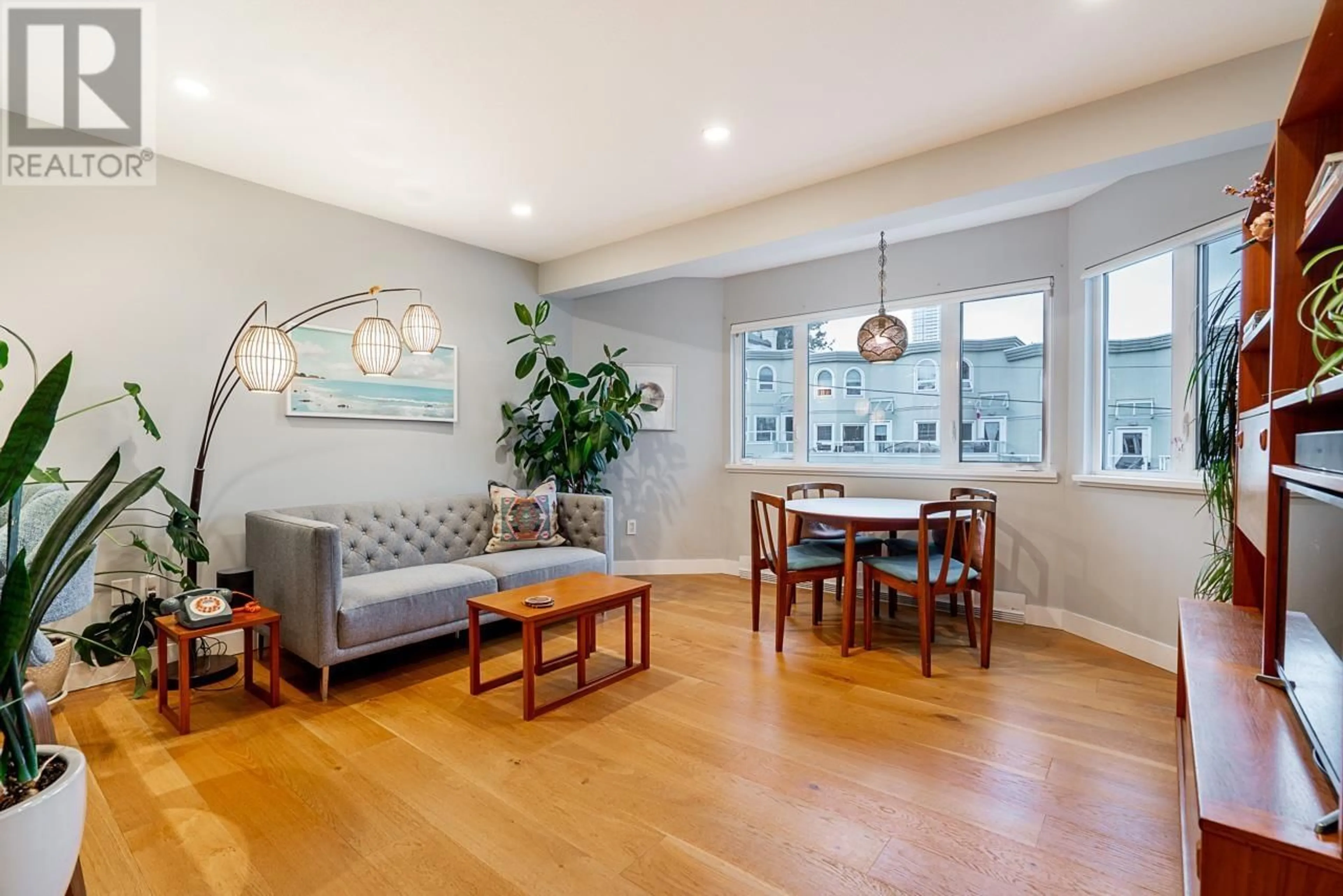 Living room with furniture, wood/laminate floor for 22 1182 W 7TH AVENUE, Vancouver British Columbia V6H1B4