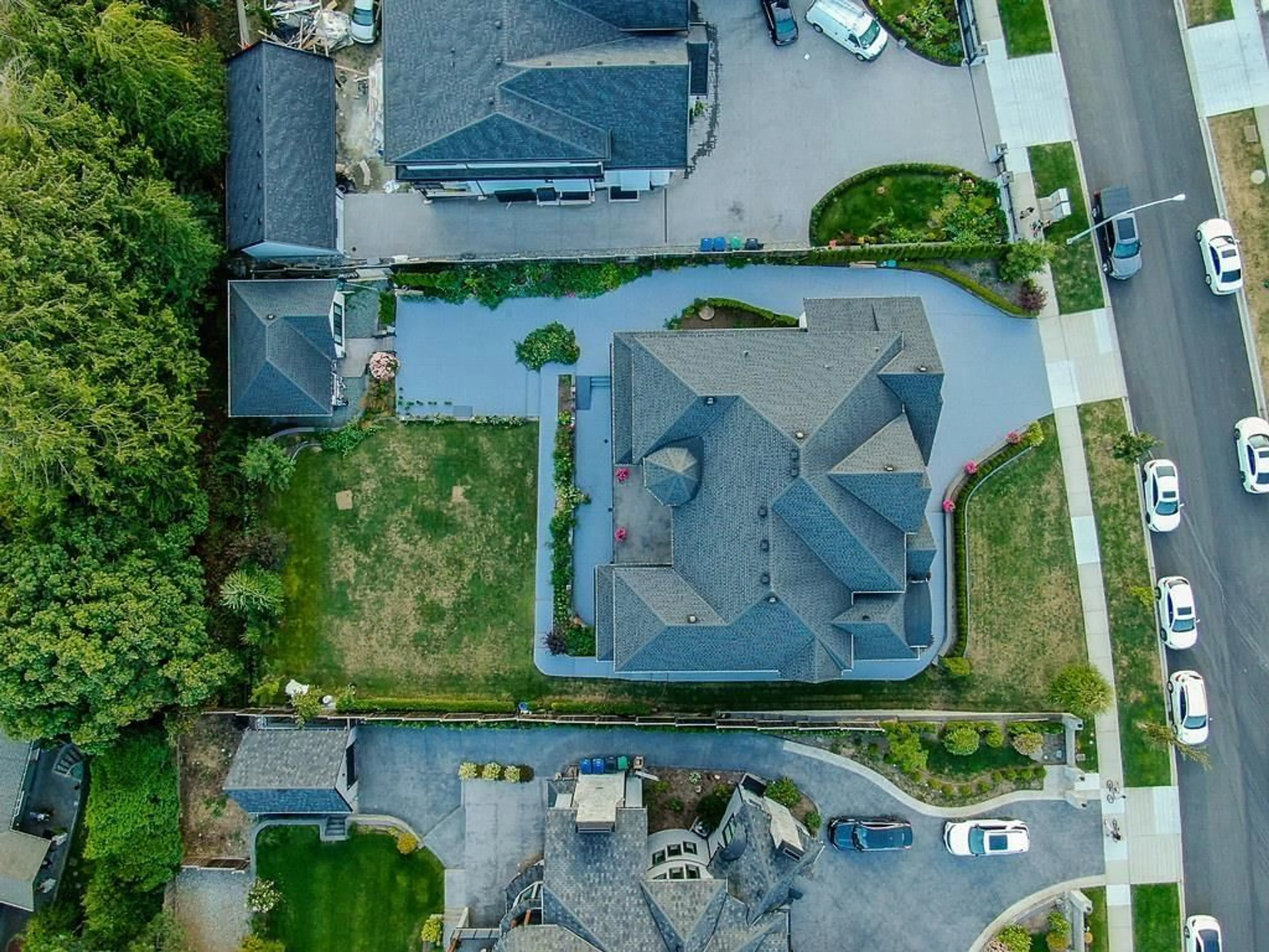 A pic from outside/outdoor area/front of a property/back of a property/a pic from drone, street for 14468 55, Surrey British Columbia V3X0H5