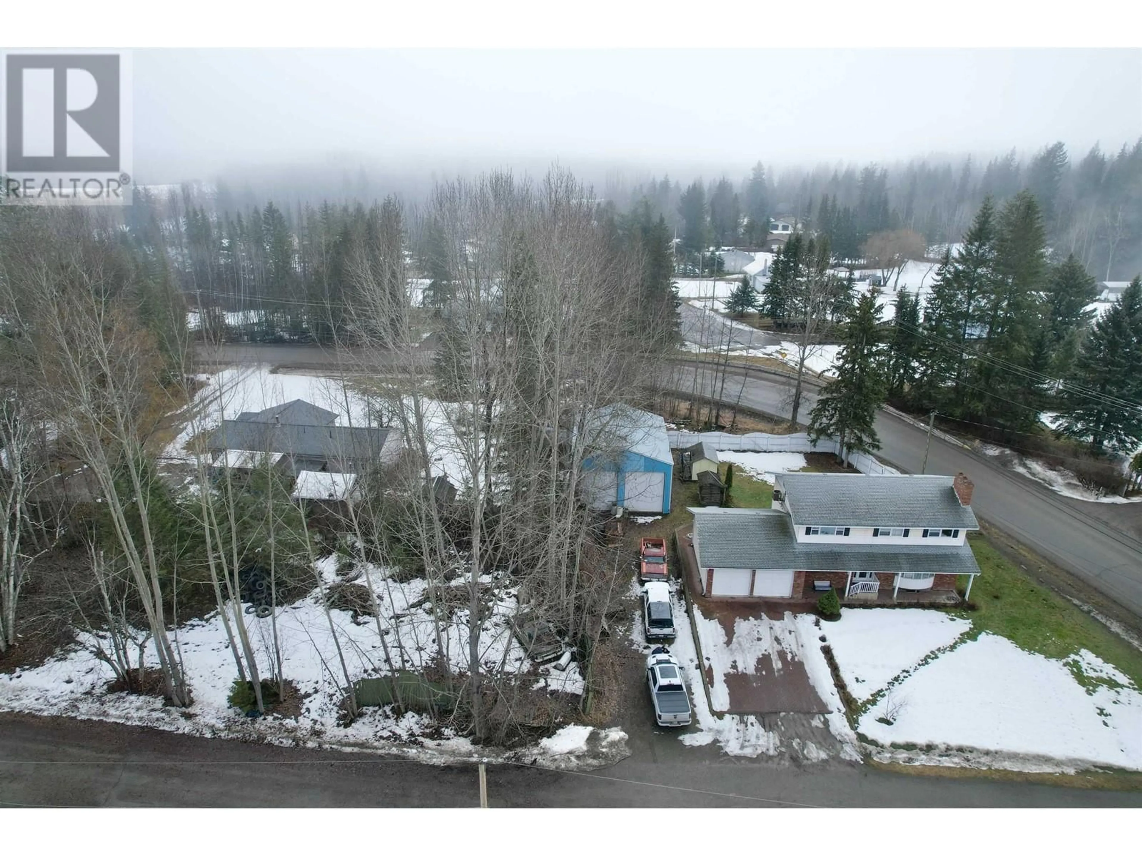 A pic from outside/outdoor area/front of a property/back of a property/a pic from drone, mountain view for 1012 ROSE ROAD, Quesnel British Columbia V2J5L1