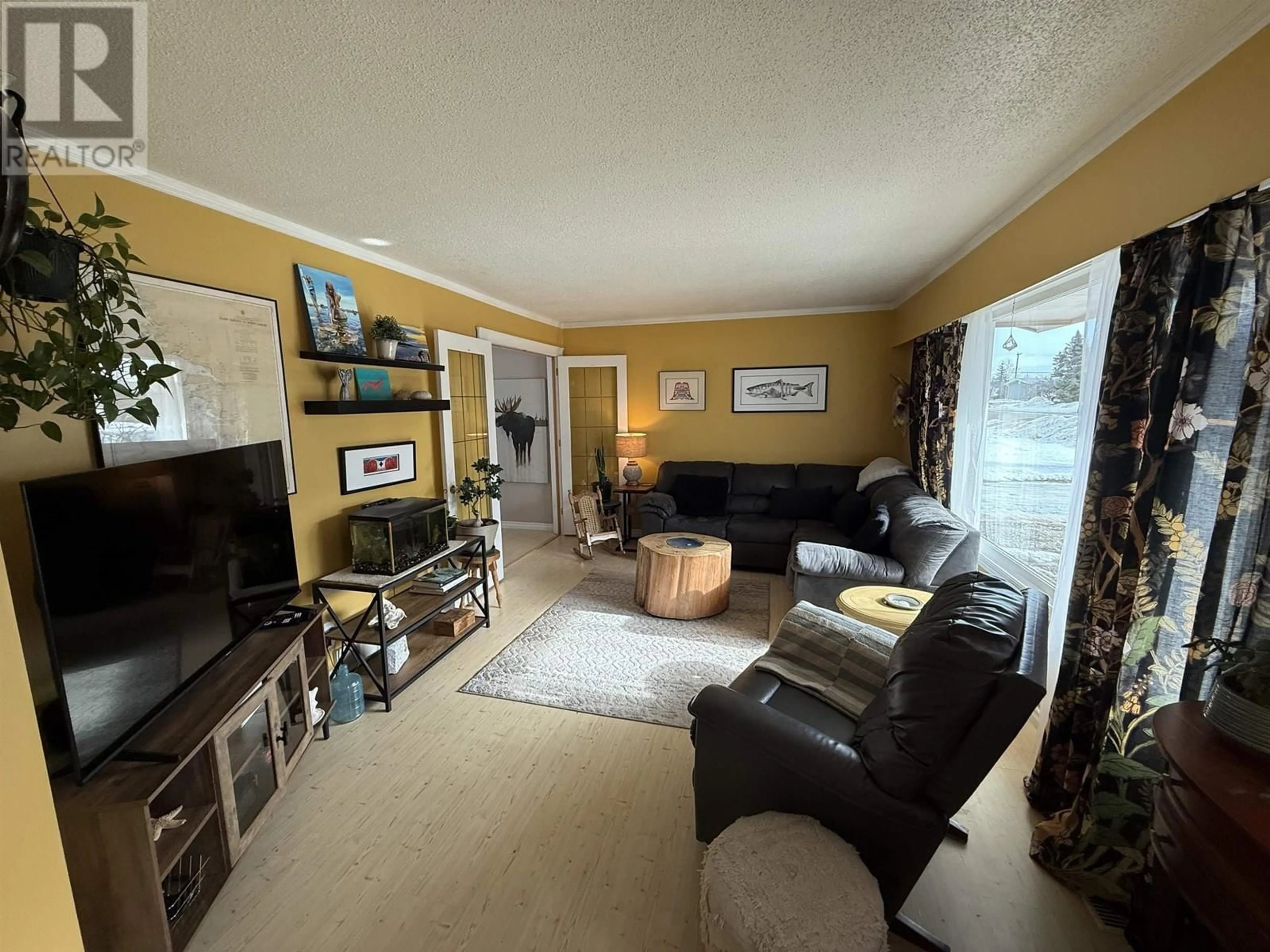 Living room with furniture, unknown for 9304 106 AVENUE, Fort St. John British Columbia V1J2N4