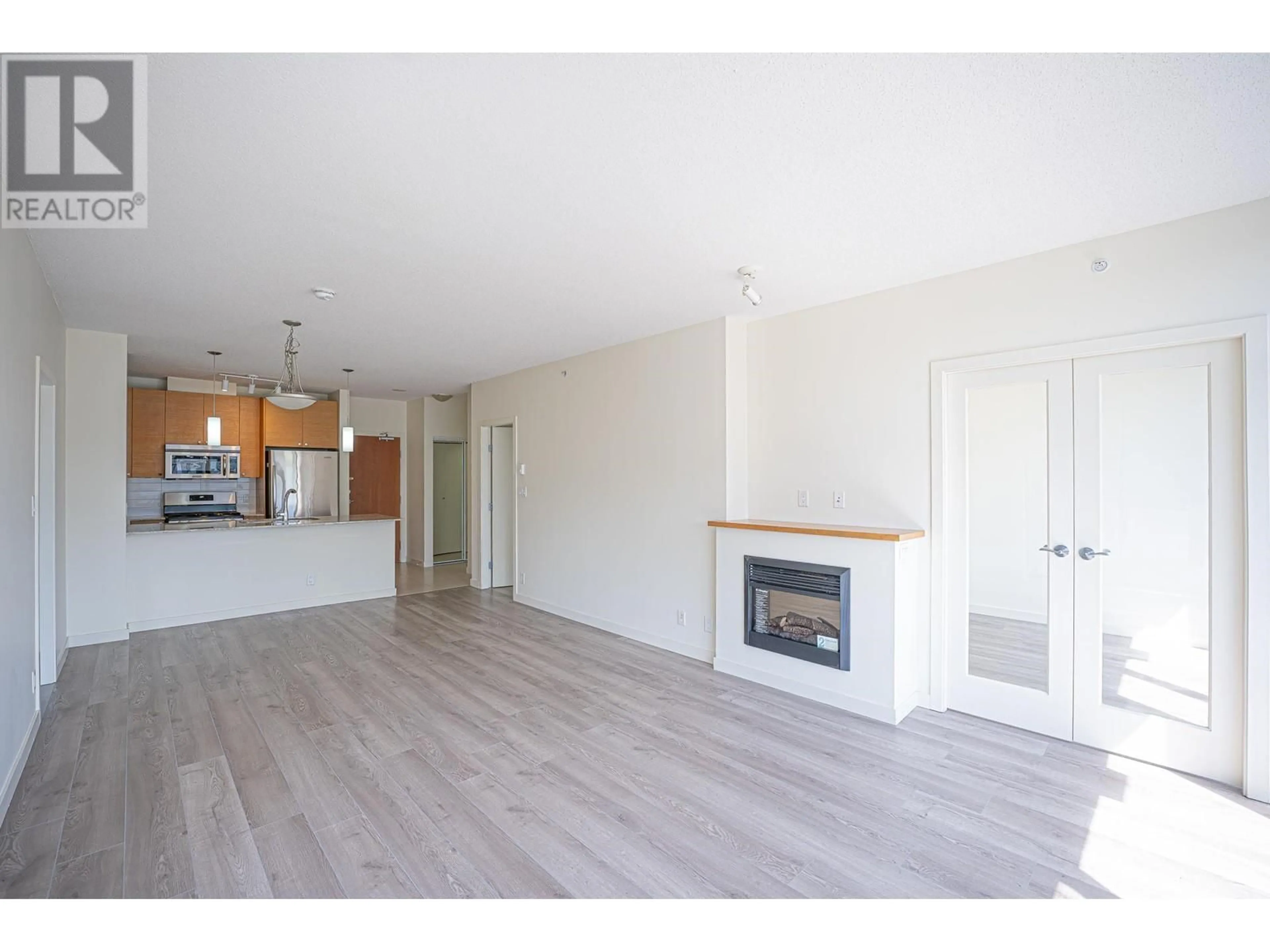 Open concept kitchen, wood/laminate floor for 1103 - 110 BREW STREET, Port Moody British Columbia V3H0E4