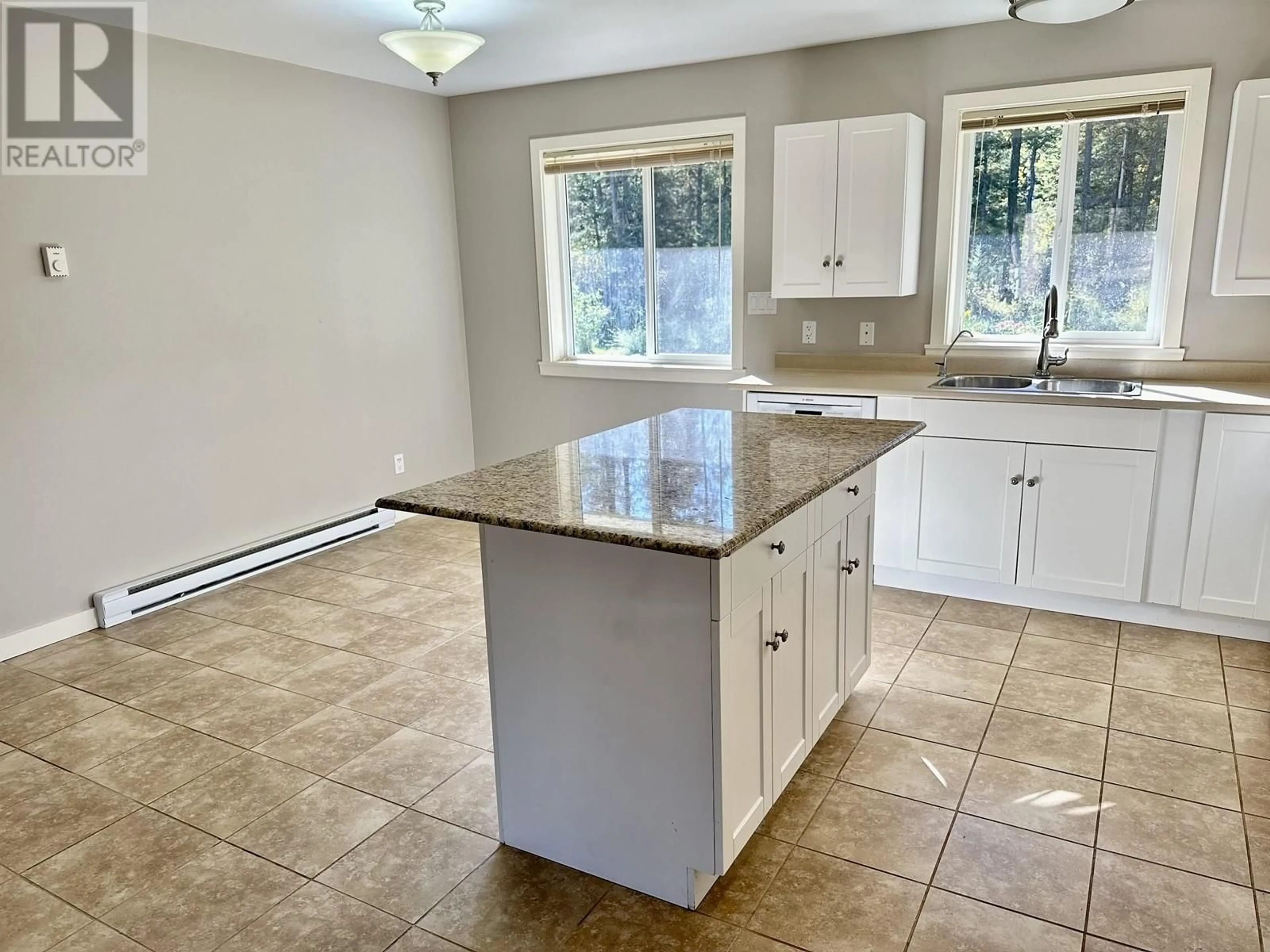 Open concept kitchen, ceramic/tile floor for 5006 CANIUM COURT, 108 Mile Ranch British Columbia V0K2Z0