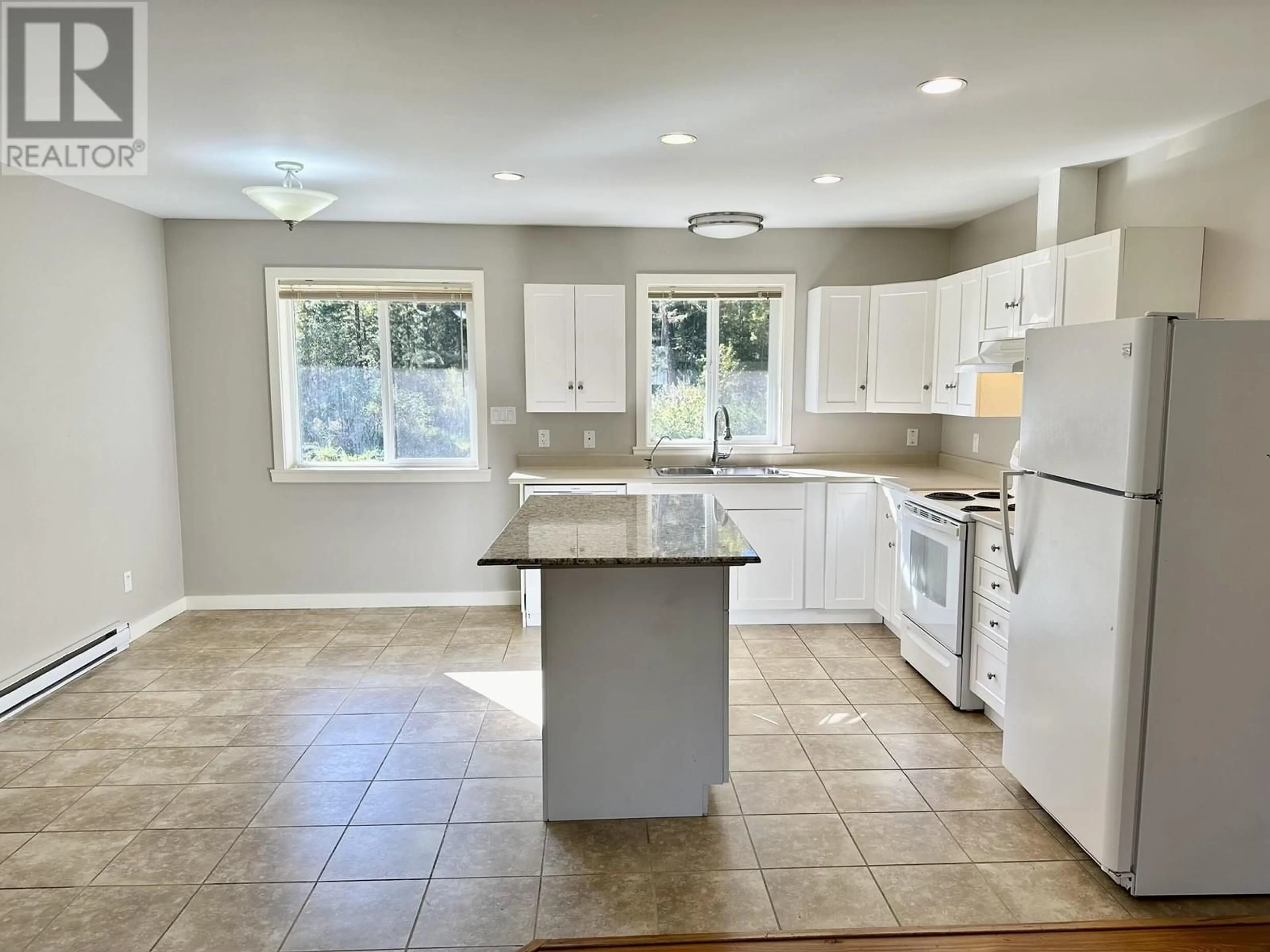 Open concept kitchen, ceramic/tile floor for 5006 CANIUM COURT, 108 Mile Ranch British Columbia V0K2Z0