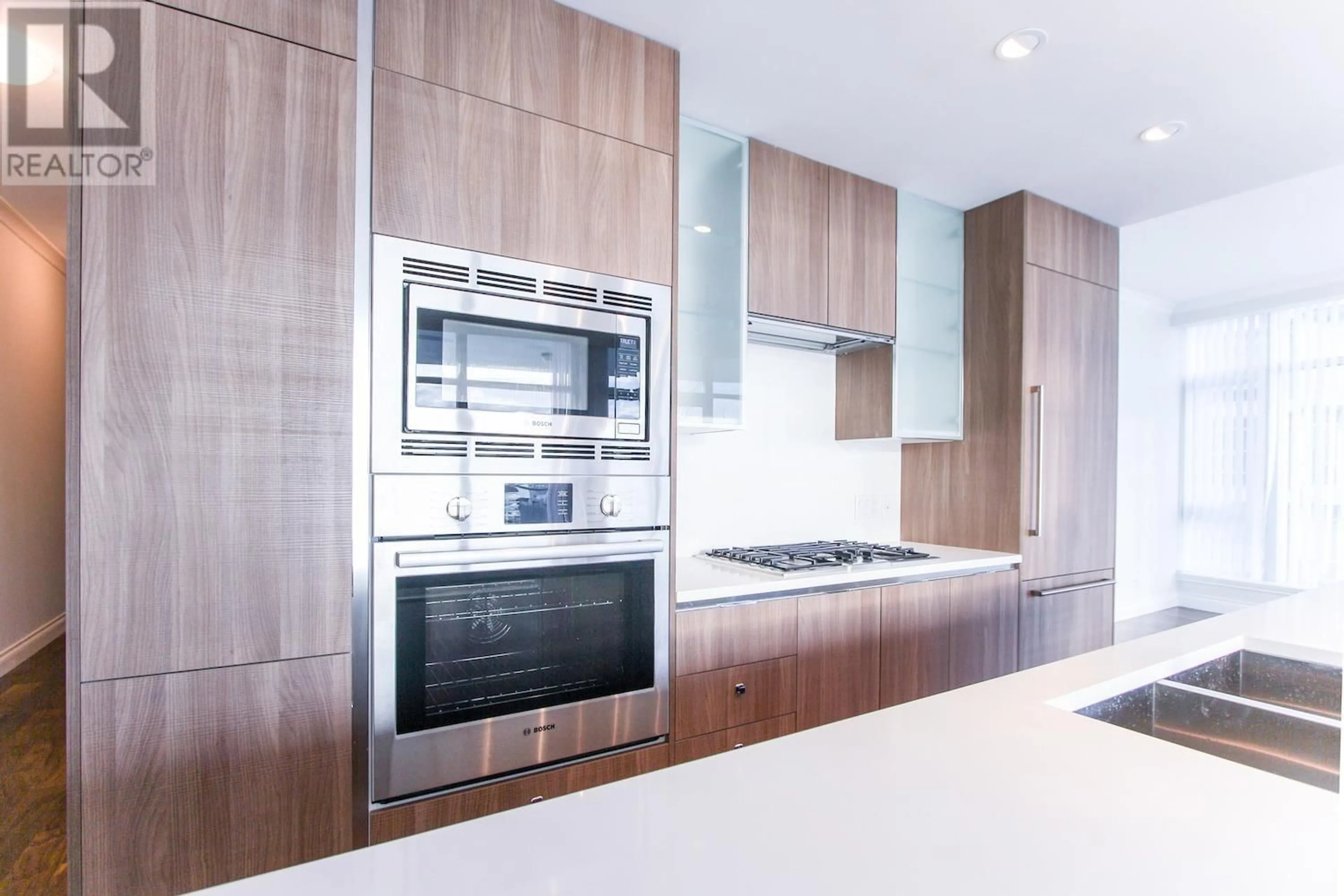 Contemporary kitchen, unknown for 701 - 185 VICTORY SHIP WAY, North Vancouver British Columbia V7L0G2