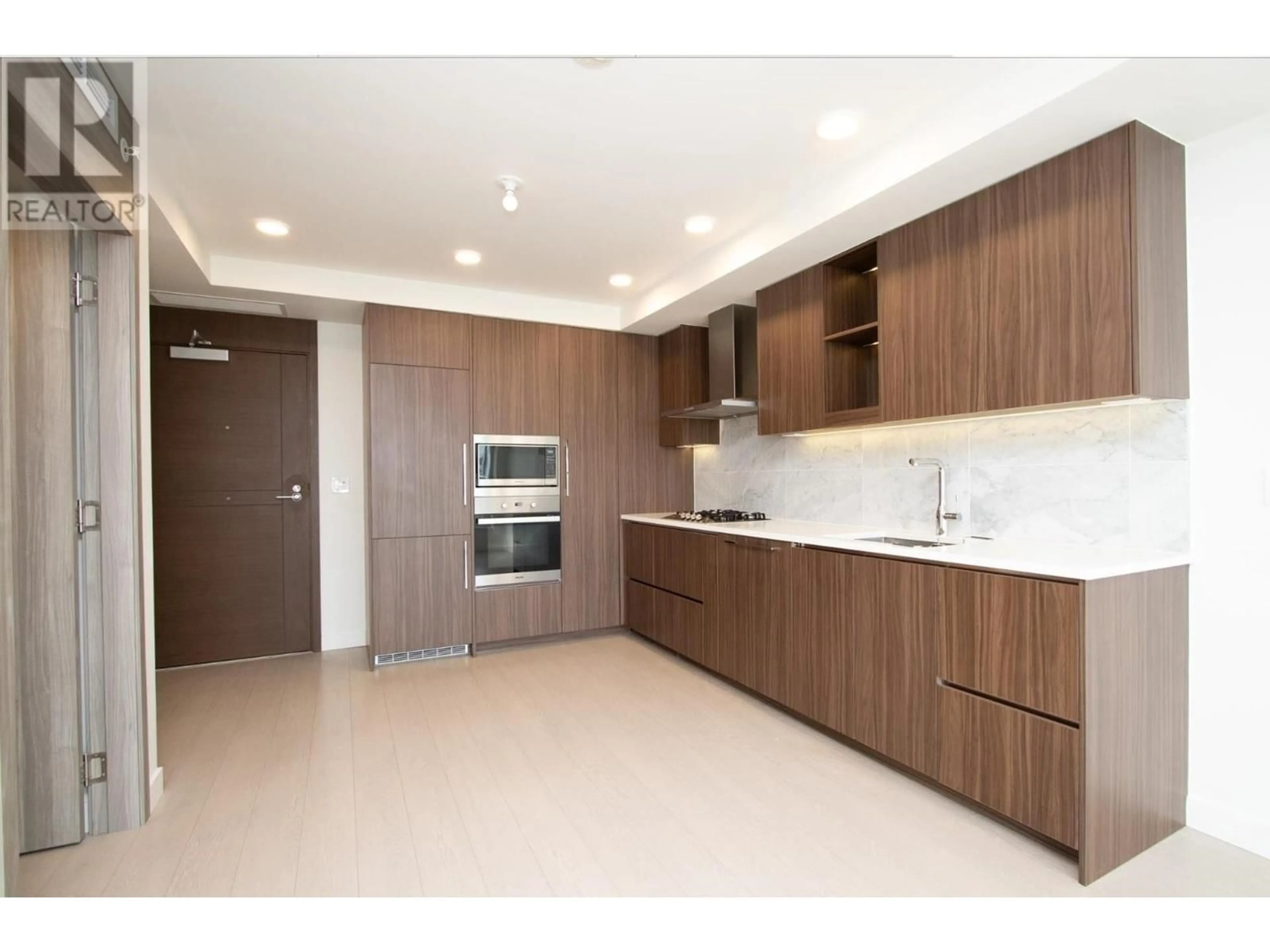 Open concept kitchen, unknown for 2205 433 SW MARINE DRIVE, Vancouver British Columbia V5X0H5