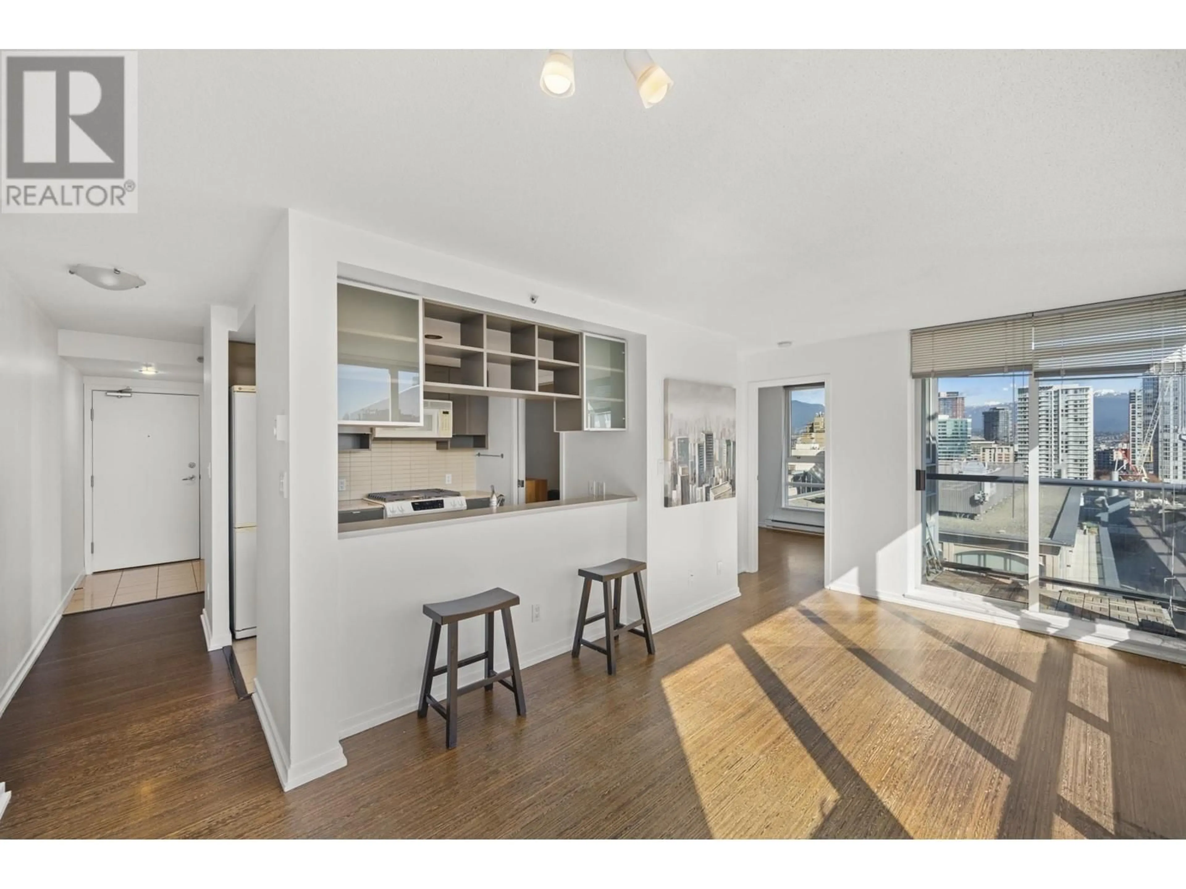 Open concept kitchen, wood/laminate floor for 2005 928 BEATTY STREET, Vancouver British Columbia V6Z3G6