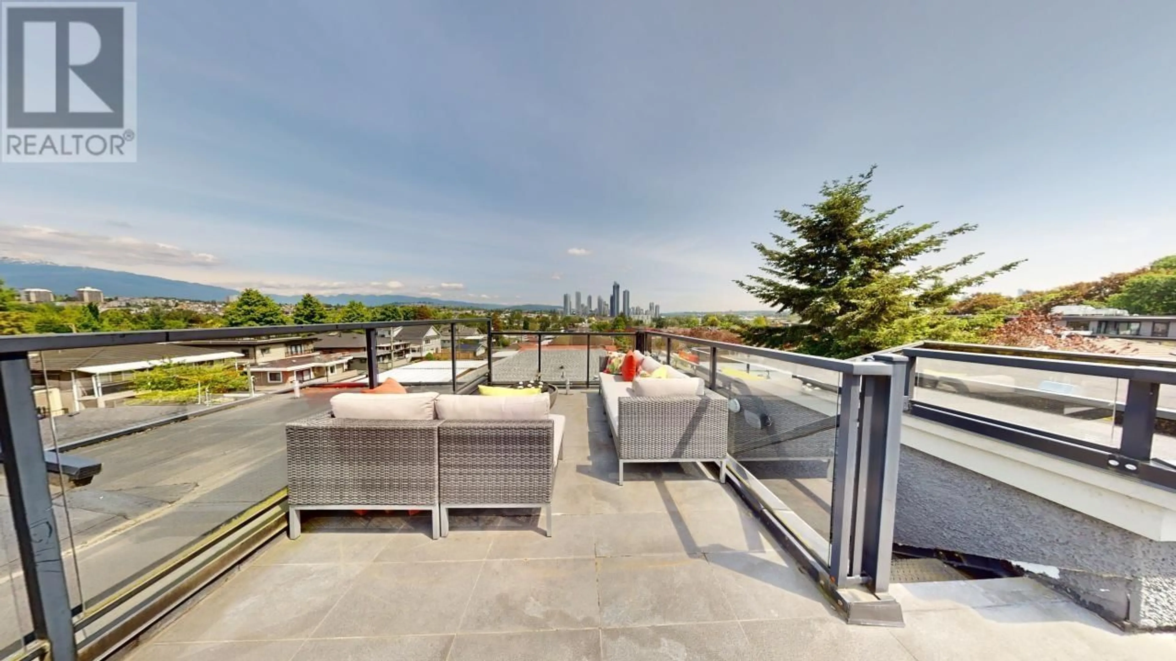 Patio, city buildings view from balcony for 3317 3RD AVENUE, Vancouver British Columbia V5M1J5