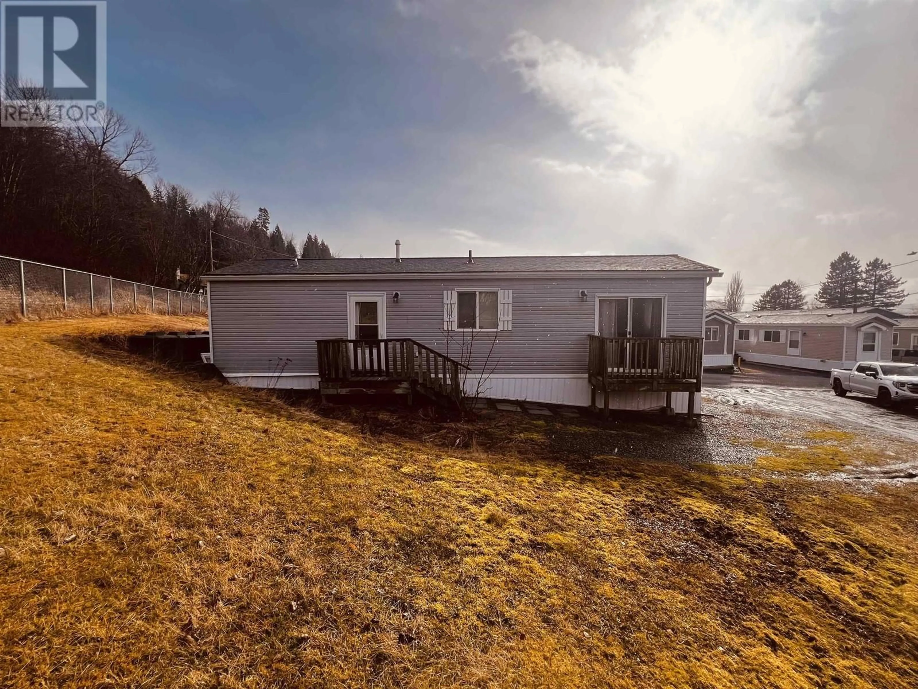 A pic from outside/outdoor area/front of a property/back of a property/a pic from drone, water/lake/river/ocean view for 52 - 3614 KALUM STREET, Terrace British Columbia V8G2E1