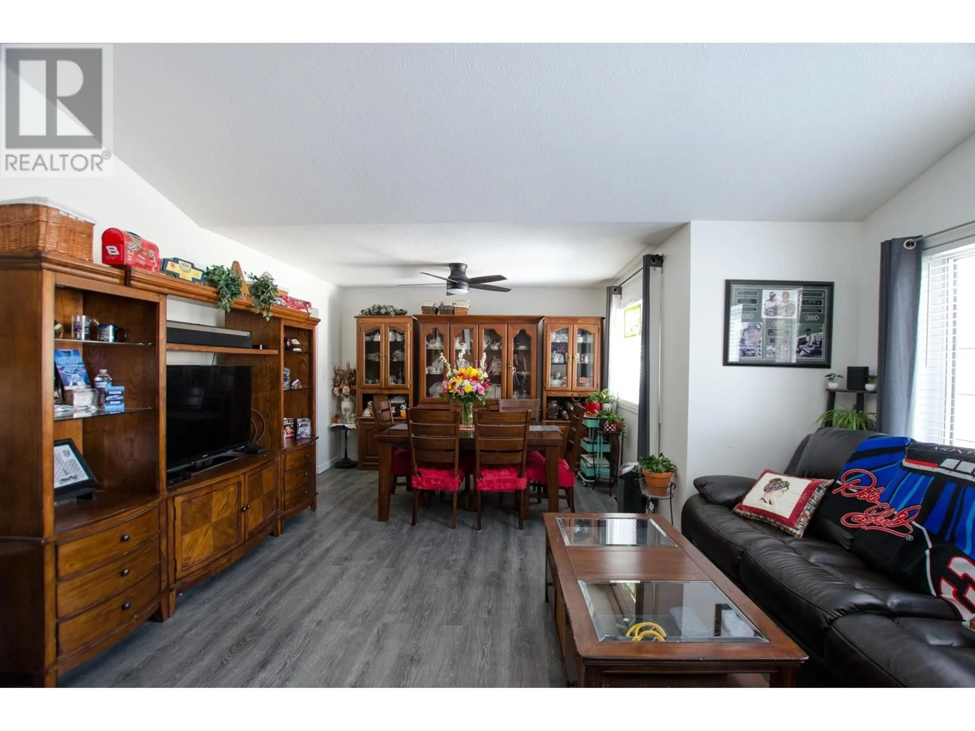 Living room with furniture, wood/laminate floor for 2045 CROFT ROAD, Prince George British Columbia V2K3C8