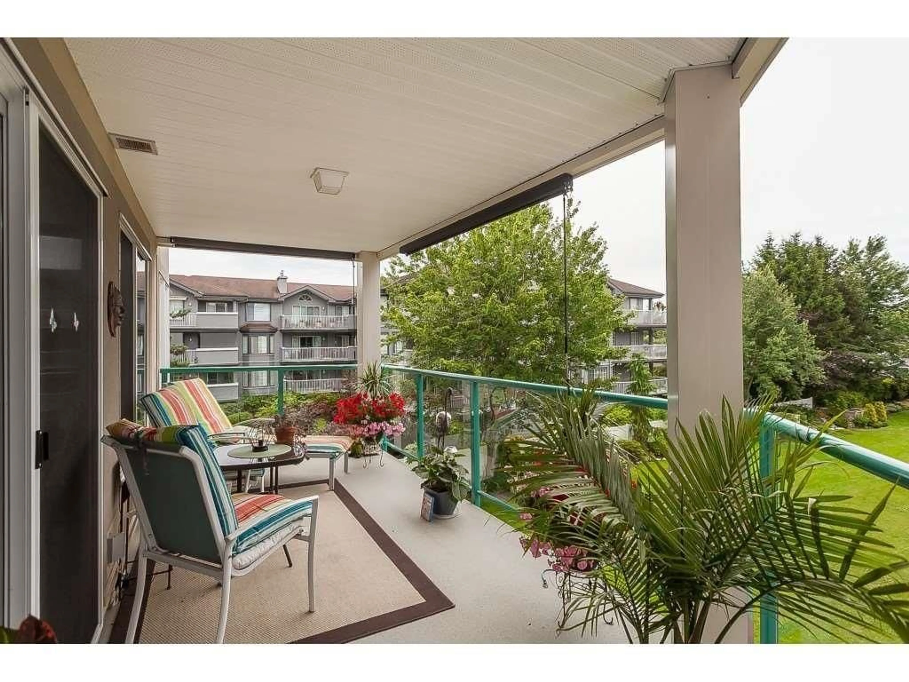 Patio, water/lake/river/ocean view for 309 20453 53 AVENUE, Langley British Columbia V3A7A6