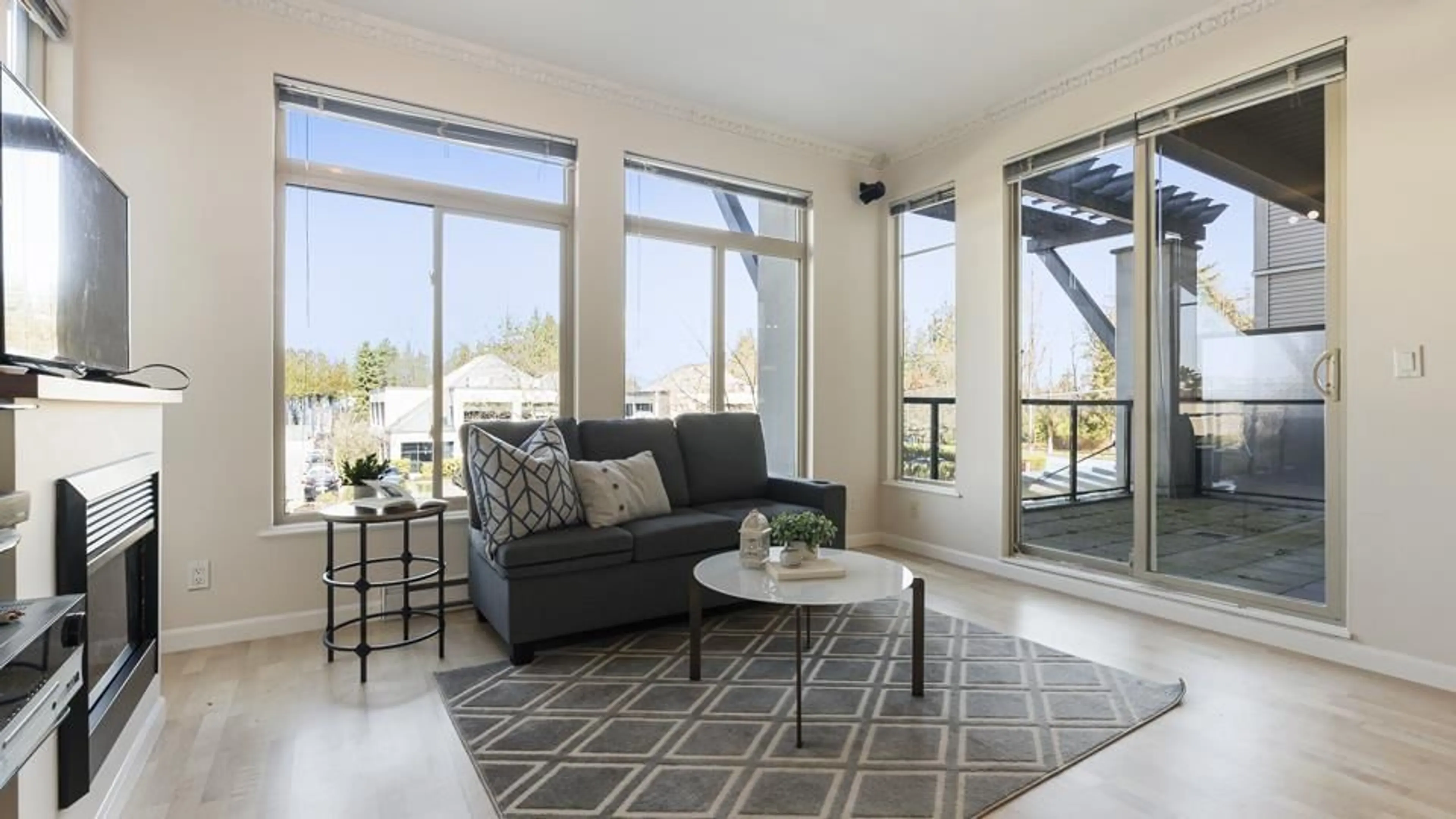 Living room with furniture, ceramic/tile floor for 218 15380 102A AVENUE, Surrey British Columbia V3R0B3