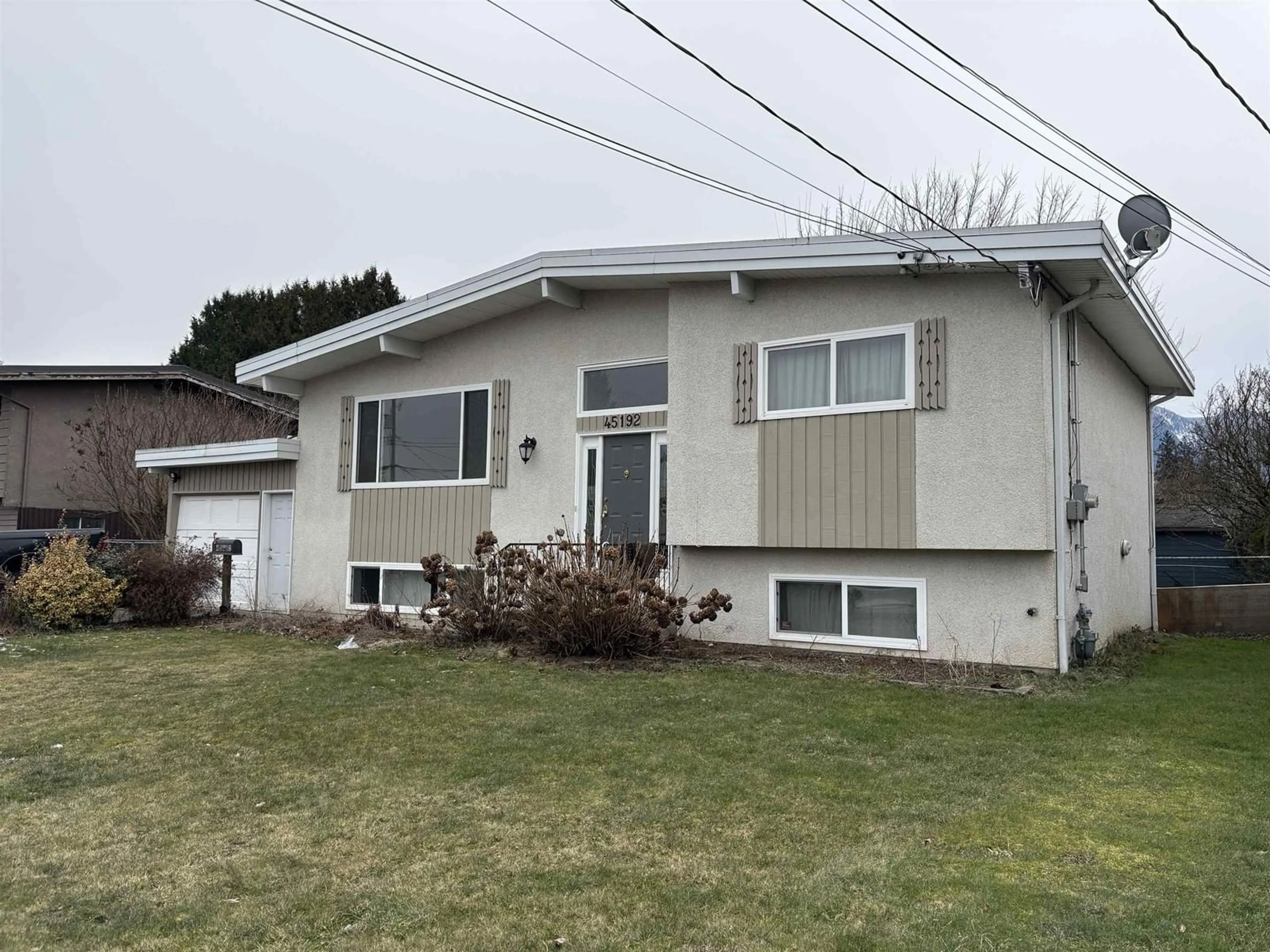 Home with vinyl exterior material, street for 45192 MONTCALM ROAD|Sardis South, Chilliwack British Columbia V2R2J9