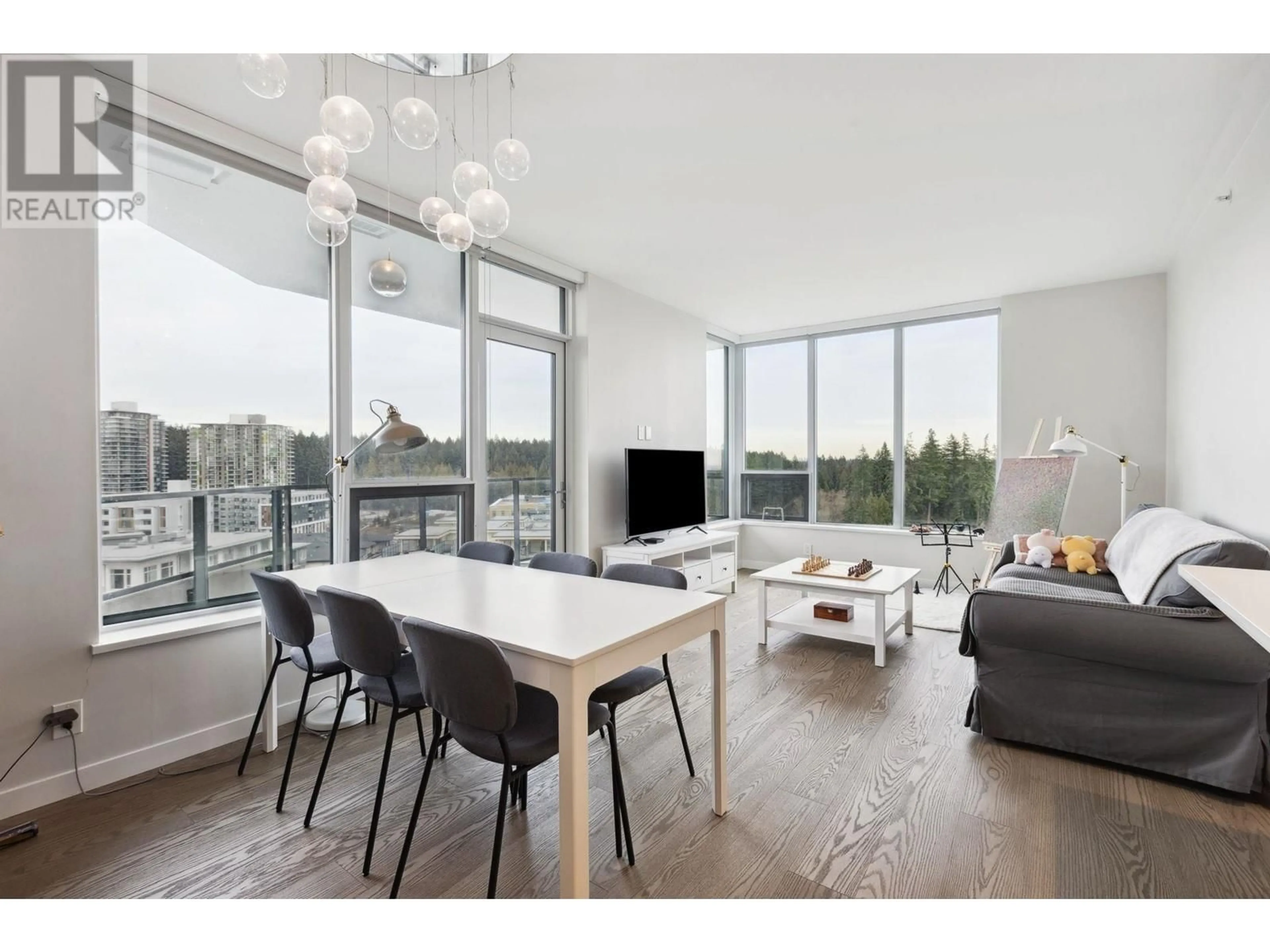 Living room with furniture, wood/laminate floor for 1206 3533 ROSS DRIVE, Vancouver British Columbia V6S0L3